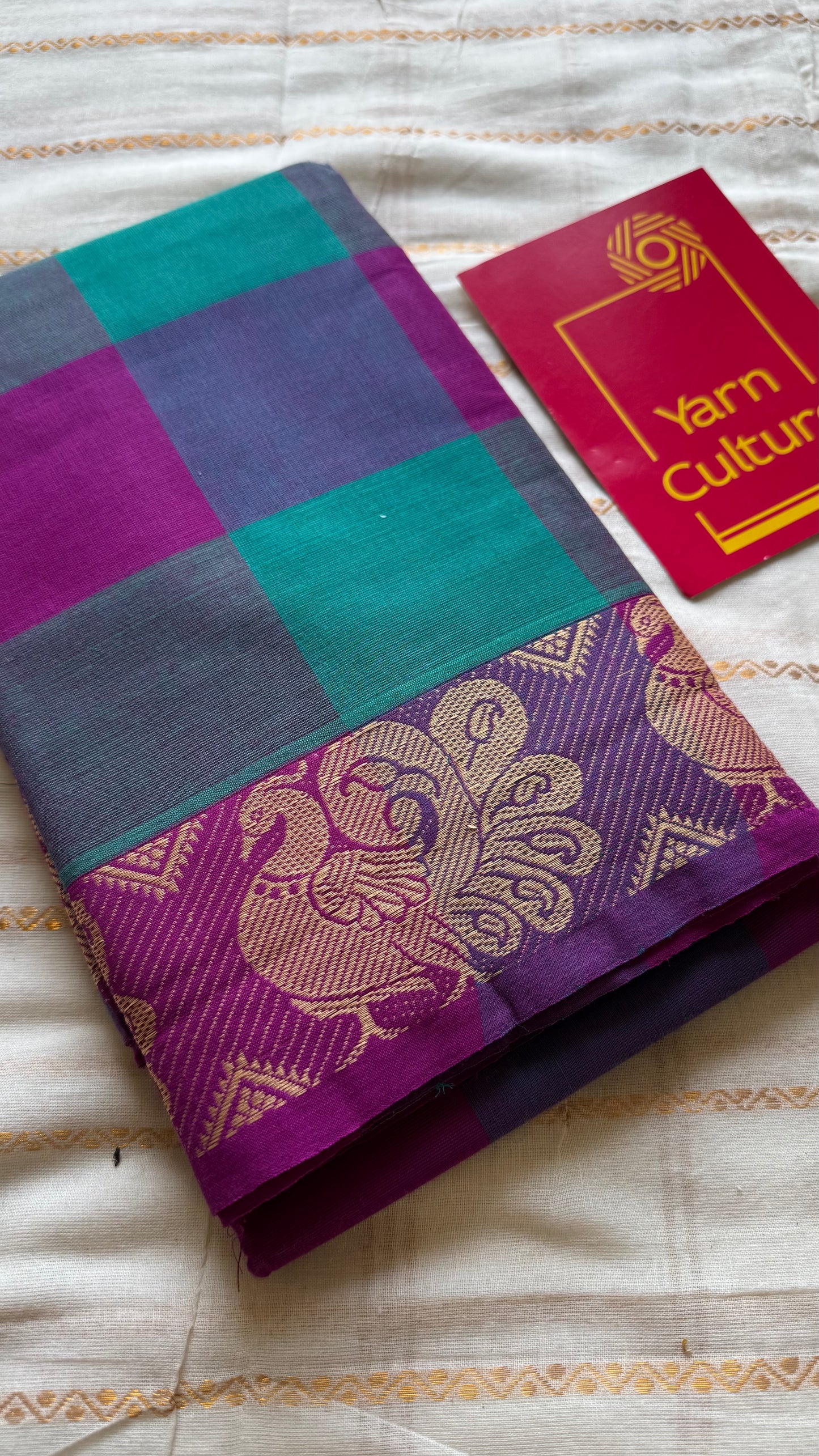 Chettinad cotton saree with magenta and cyan checks, peacock motif border - YCCOTNJUCC03
