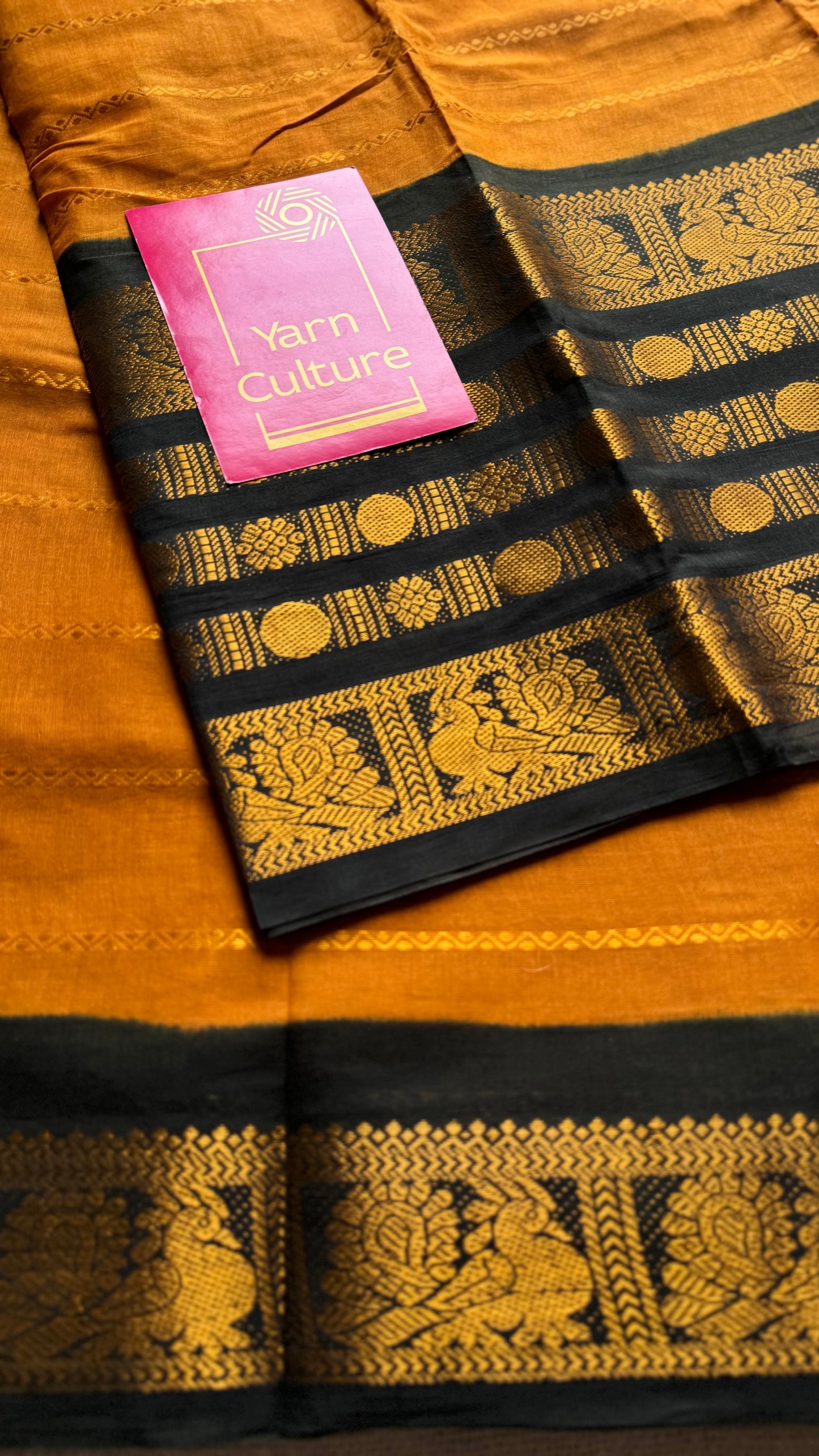 Turmeric yellow with black, peacock rudraksham motif, single side broad zari - madurai kattuchayam dyed - YCCOTNAUS27