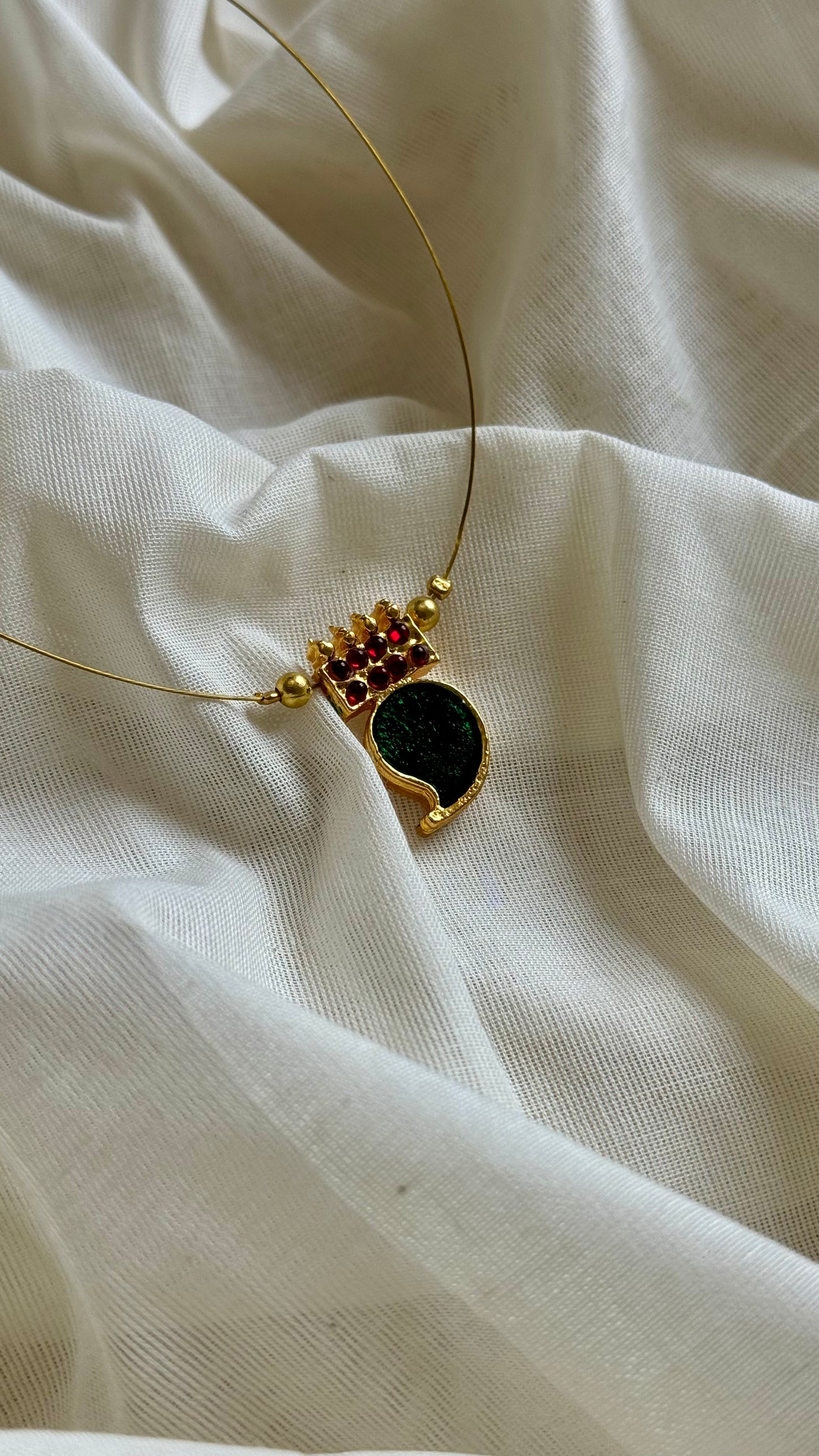 Single mango palakka pendant in invisible chain - YCAGC102