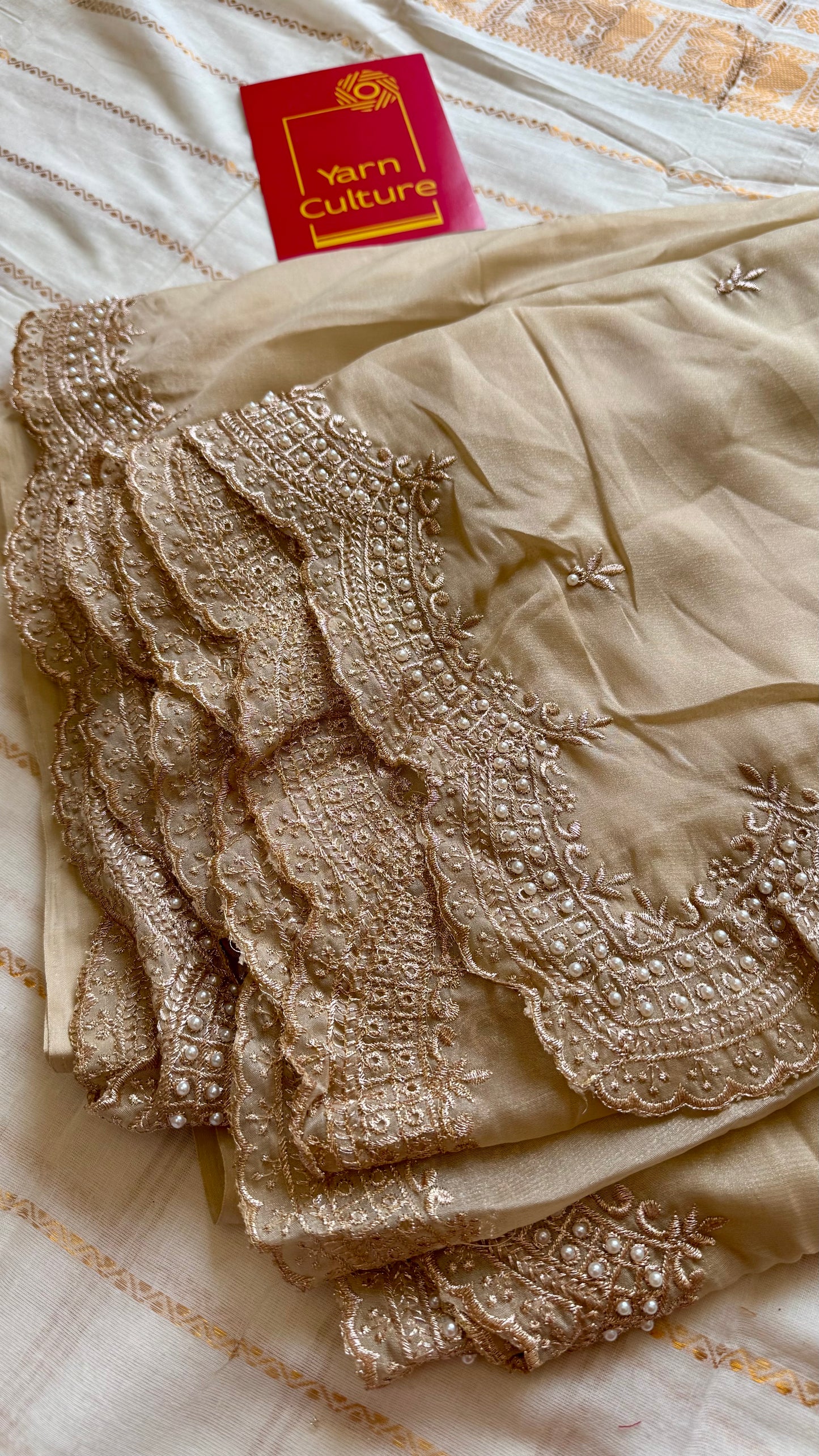 Gold soft chiffon saree, with pearl embellished border - YCIEON85