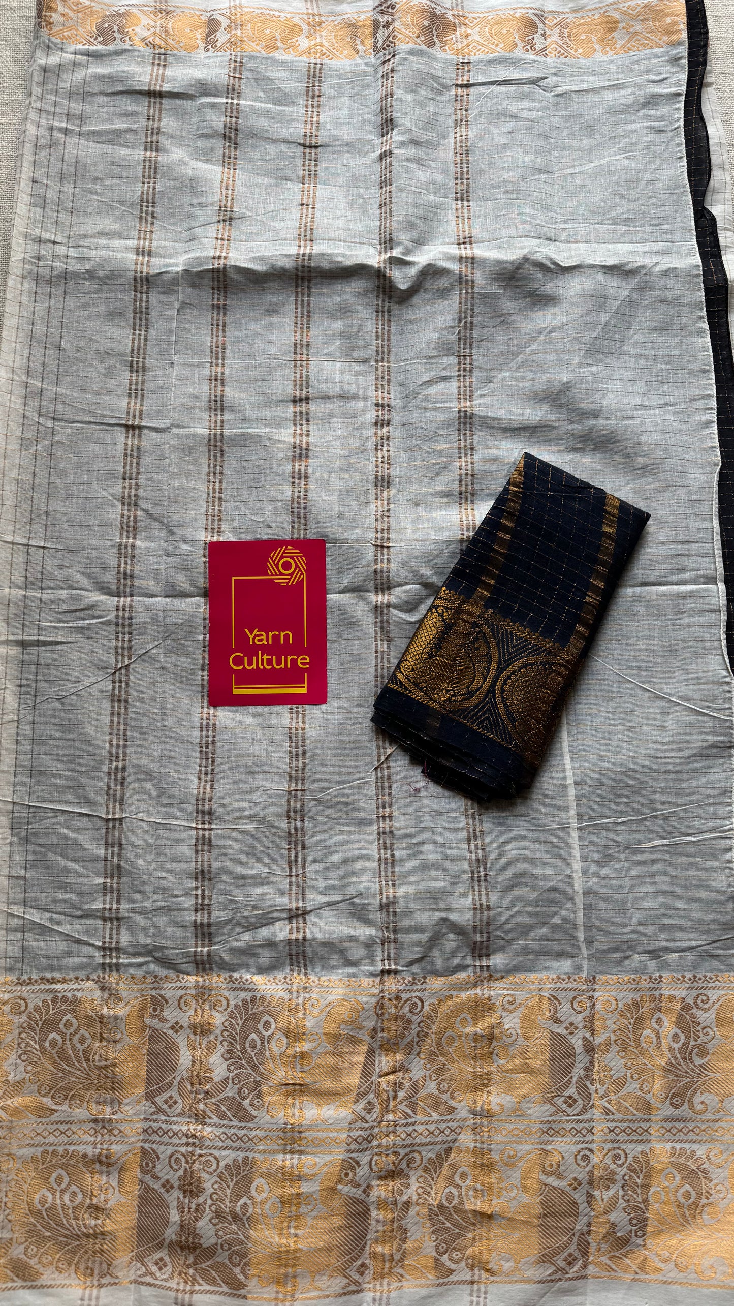 Ivory with black, sungudi cotton half-half saree - YCCOTNMSFE346