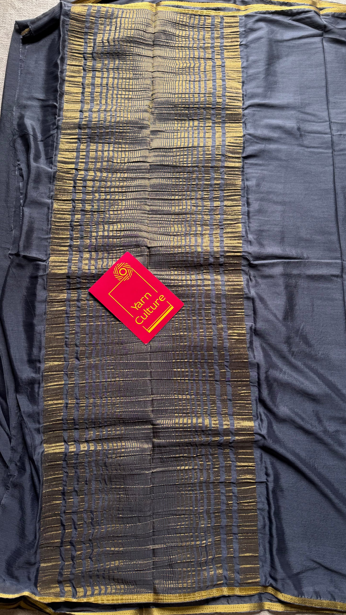Grey chiffon with thin gold zari border - YCDESE23