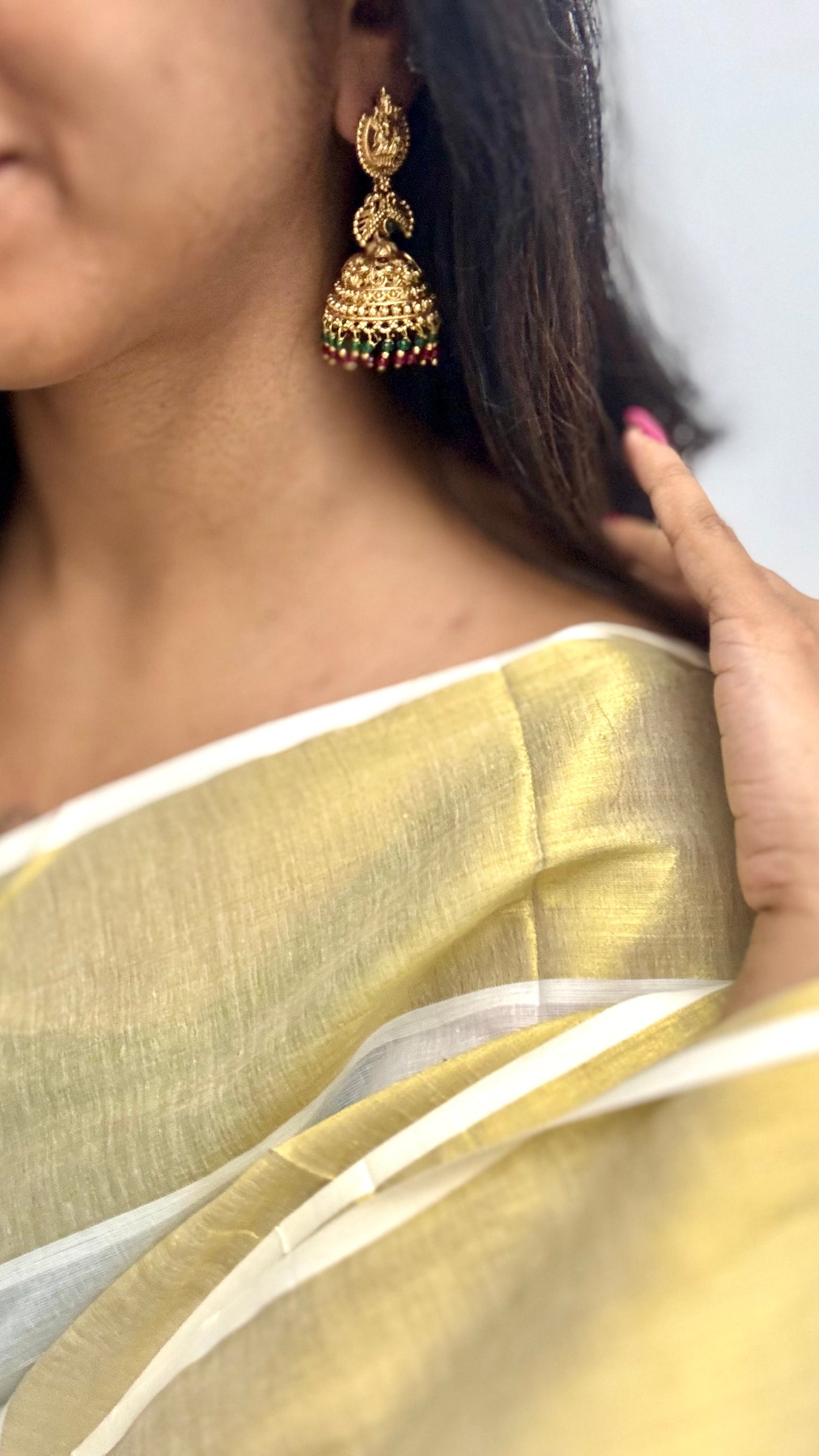 Jhumka with green and dark pink bead drops, gold finishing - YCAGJK87