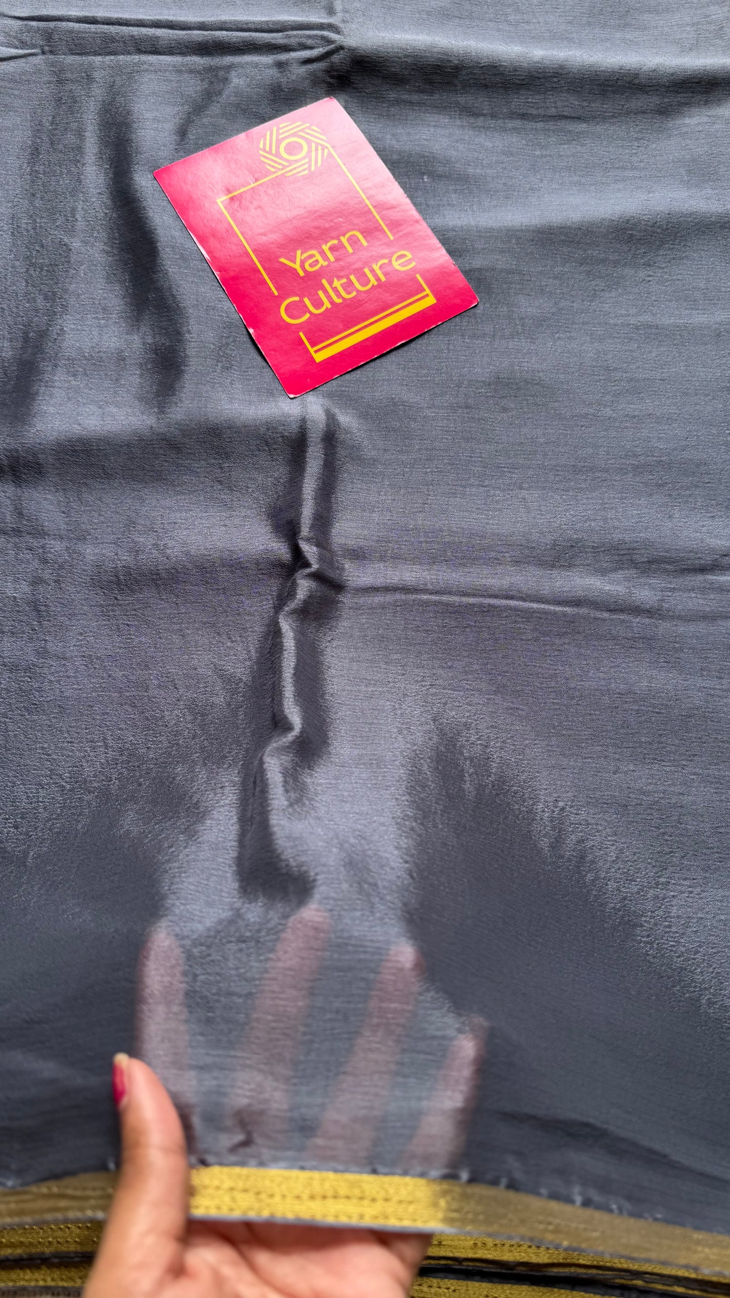 Grey chiffon with thin gold zari border - YCDESE23