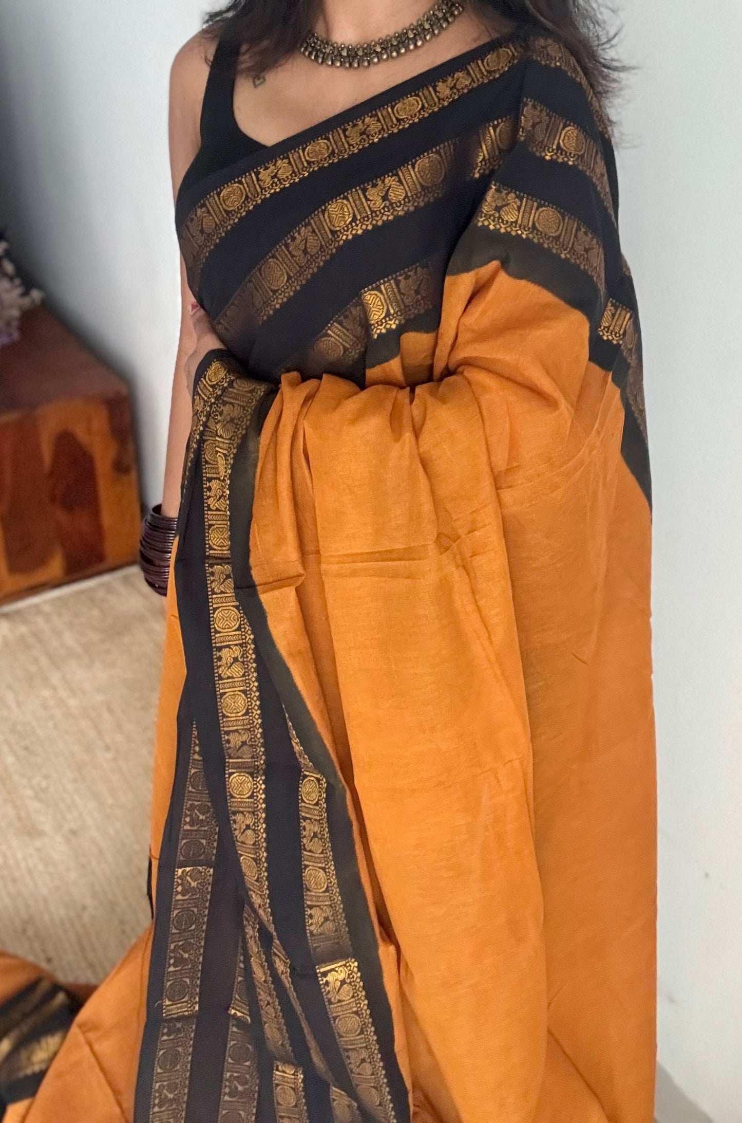Turmeric yellow with black border, peacock and rudraksham motif, madurai soft cotton - YCCOTNJUSC01