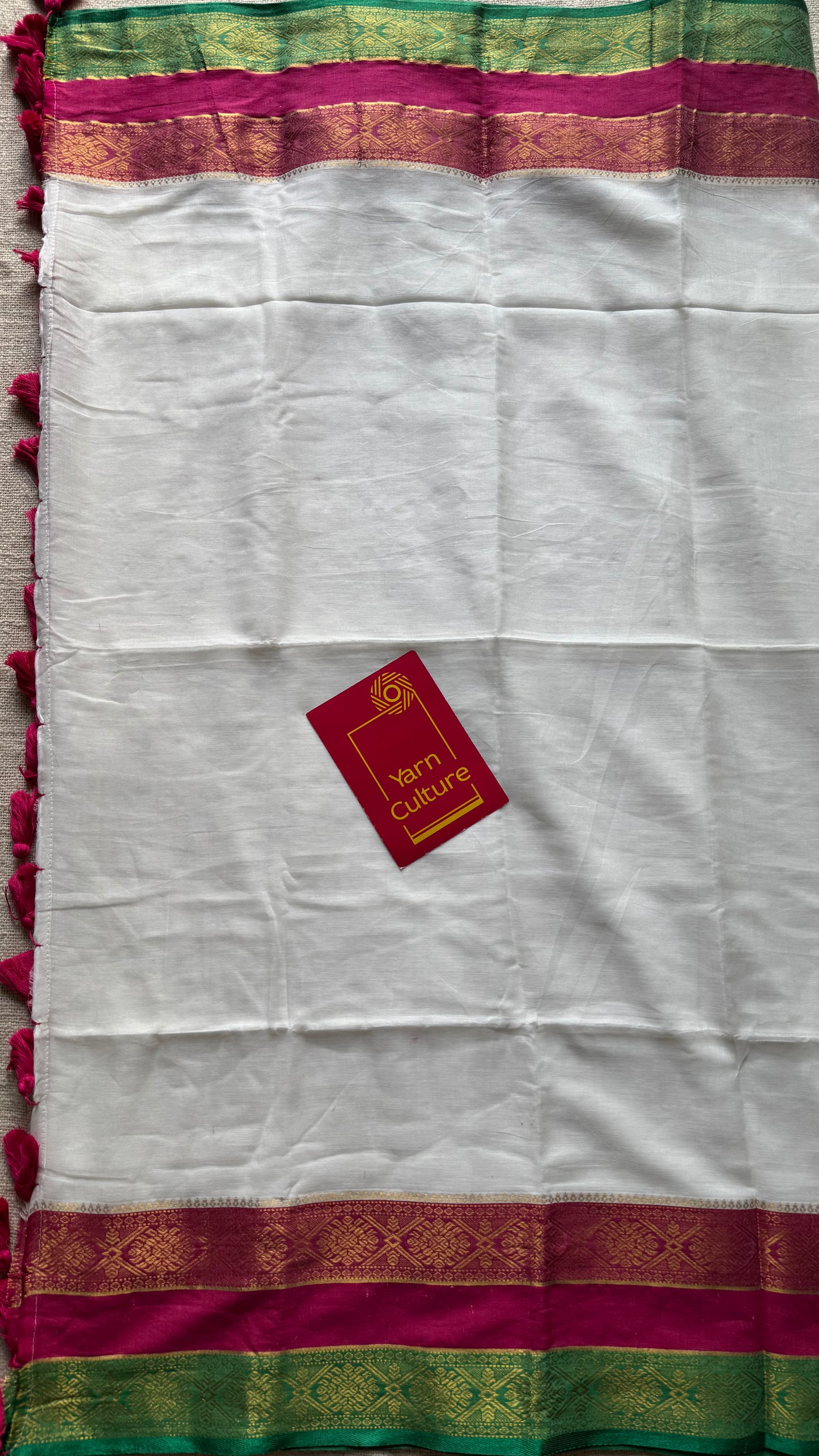 White mul with hot pink, green zari patterned border - YCBCMCLSE46
