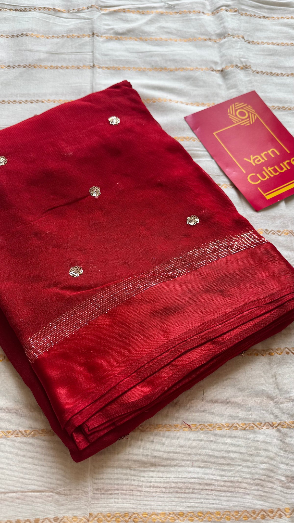 Red viscose georgette saree, gold buttas, satin border - YCDOSOC45