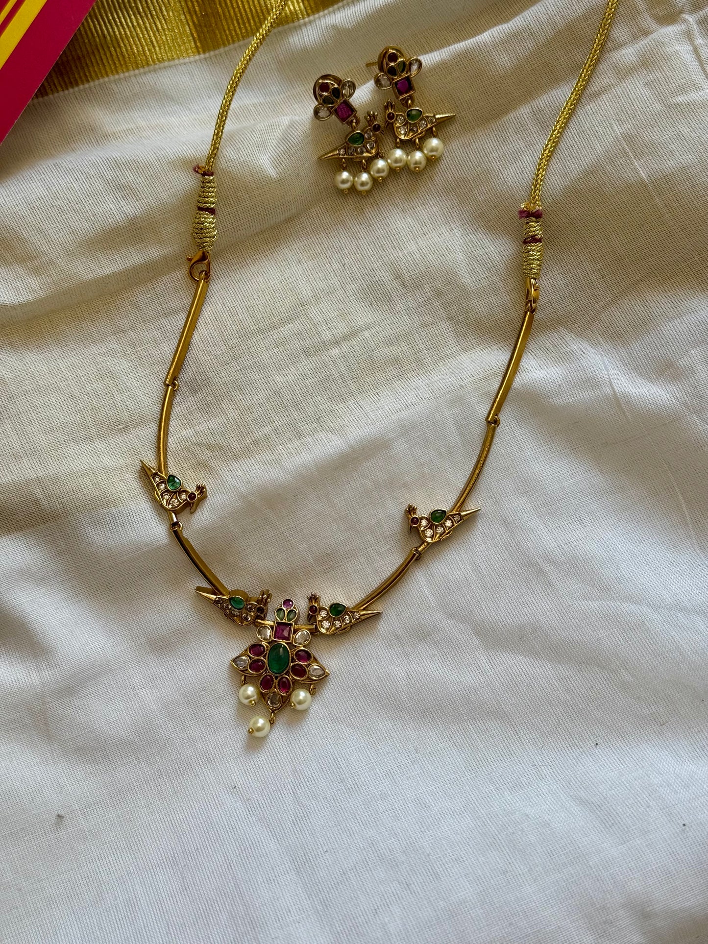 Green white ruby stones parrot hasli, floral pendant, with earrings - YCGPNP617