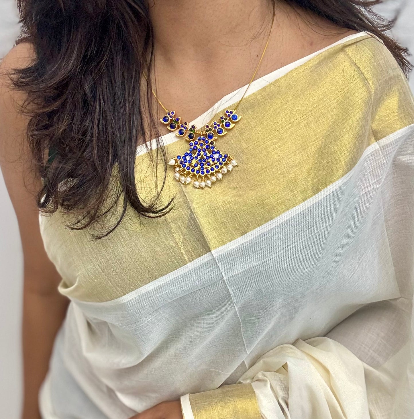 Blue stone pendant necklace