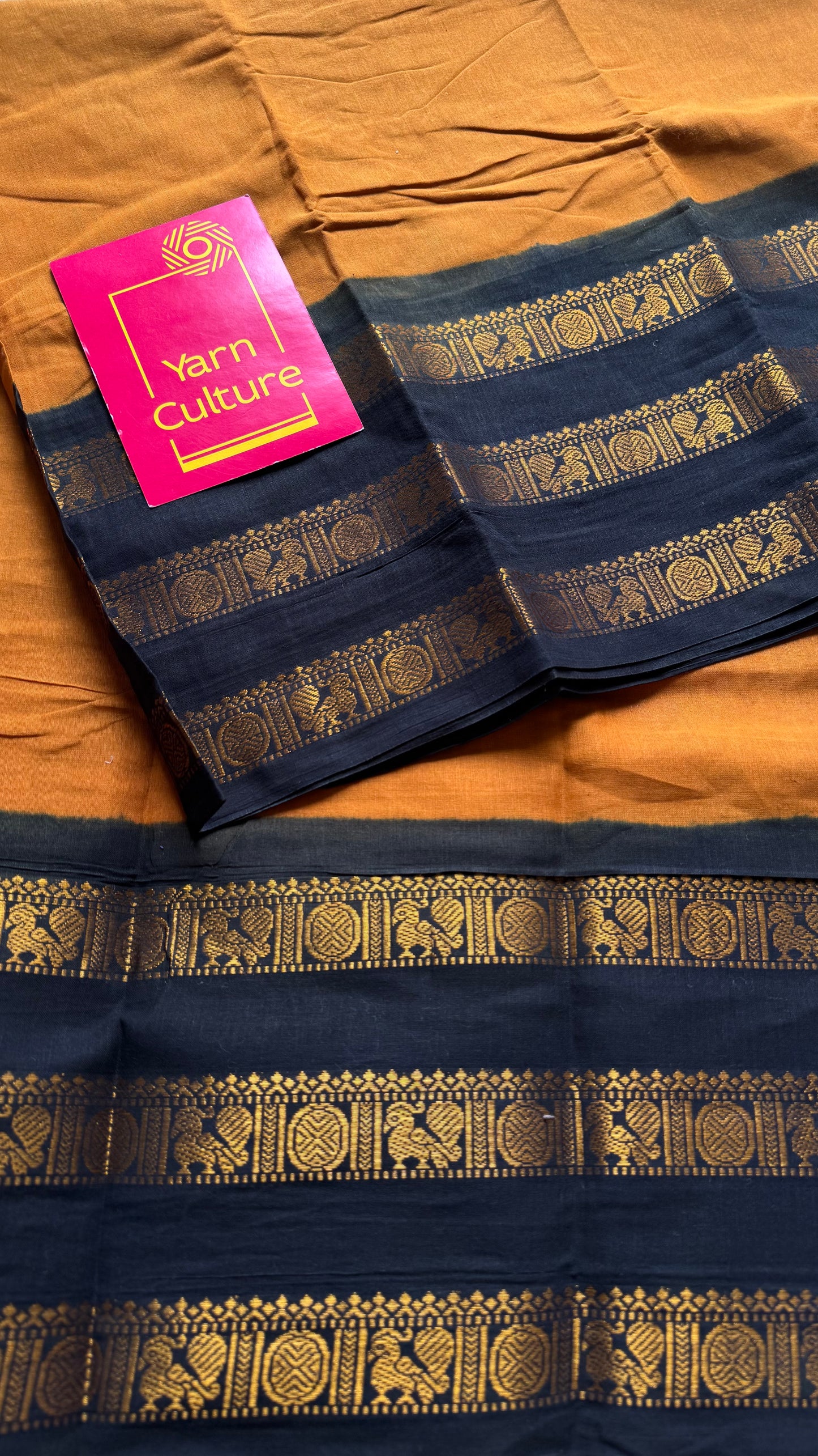 Turmeric yellow with black border, peacock and rudraksham motif, madurai soft cotton - YCCOTNJUSC01