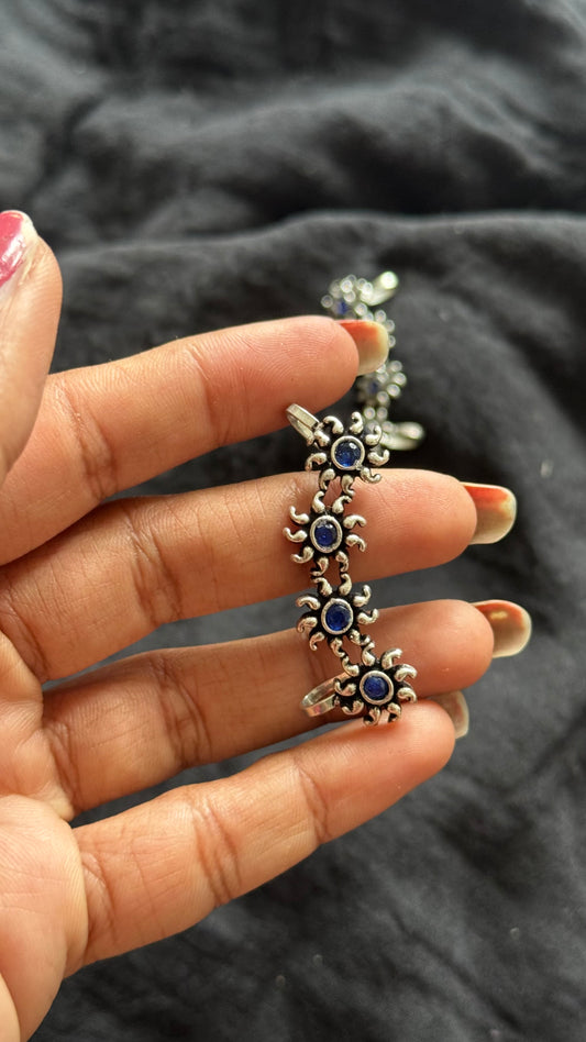 Oxidised silver, blue stone floral patterned earcuff - YCOSEC707