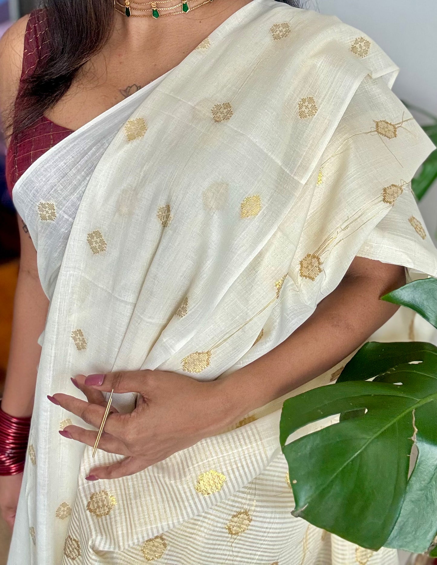 Ivory and gold kerala saree with woven buttas, striped pallu - YCIEON43