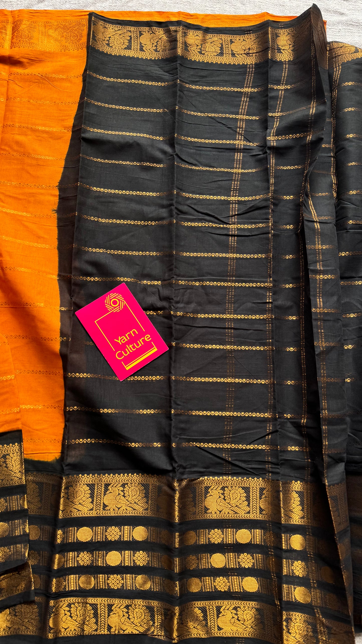 Turmeric yellow (towards orange) with black, peacock rudraksham motif, single side broad zari - madurai kattuchayam dyed - YCCOTNAURS16