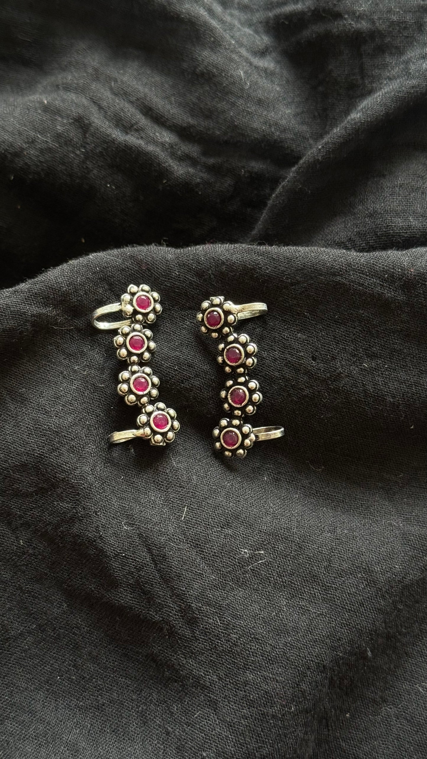 Oxidised silver, ruby stone floral patterned earcuff - YCOSEC710