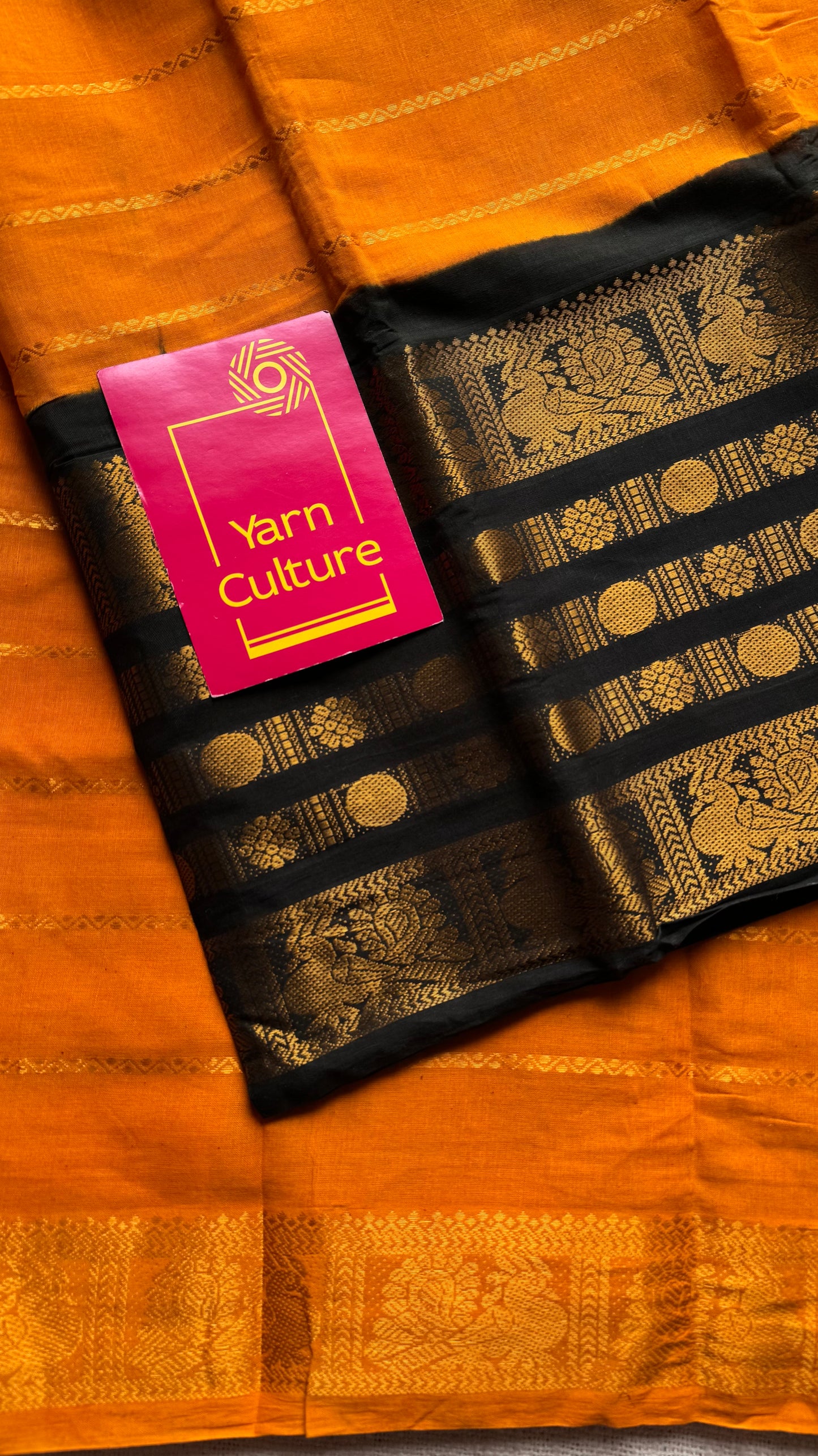 Turmeric yellow (towards orange) with black, peacock rudraksham motif, single side broad zari - madurai kattuchayam dyed - YCCOTNAURS16
