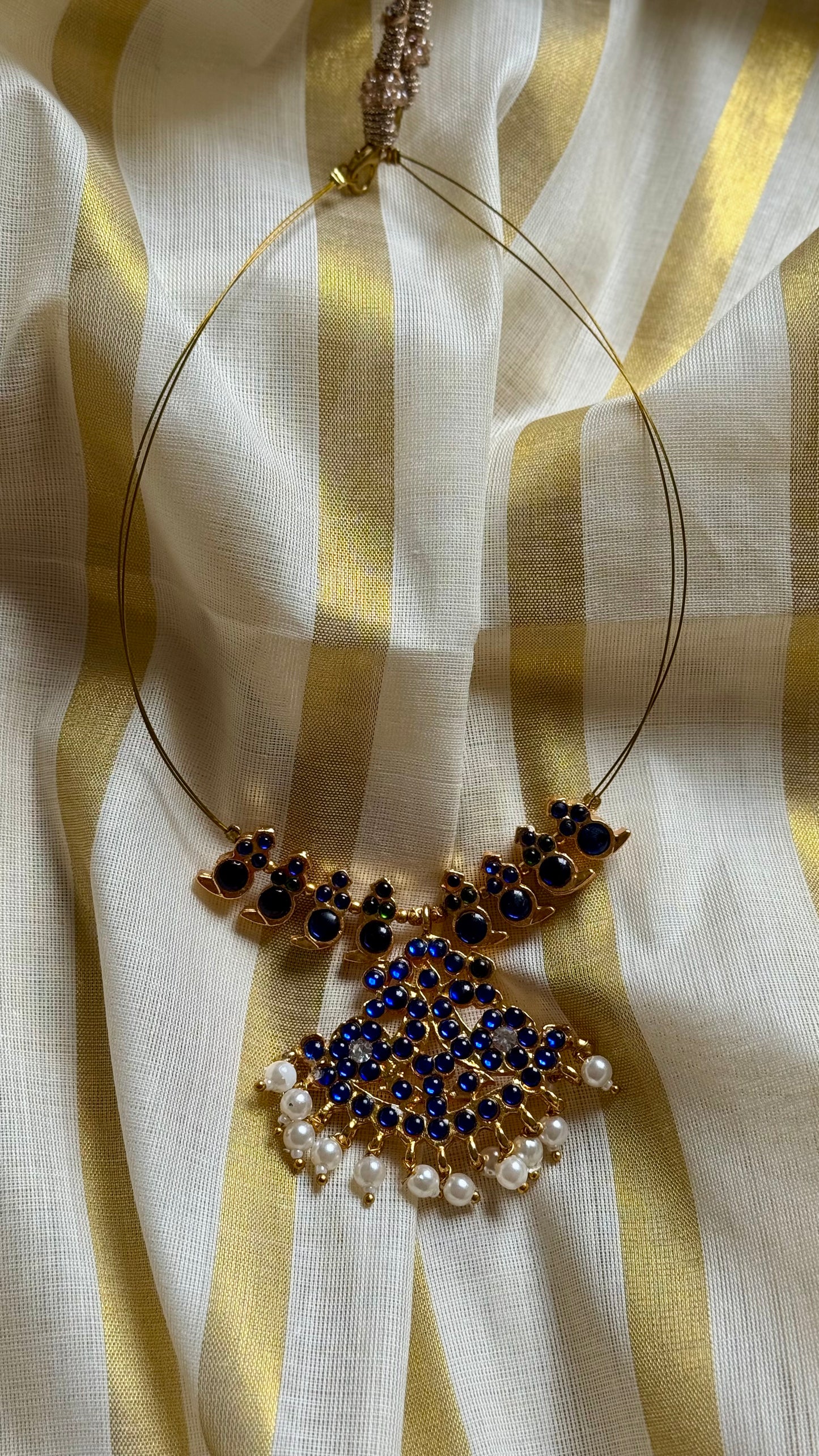 Blue stone pendant necklace
