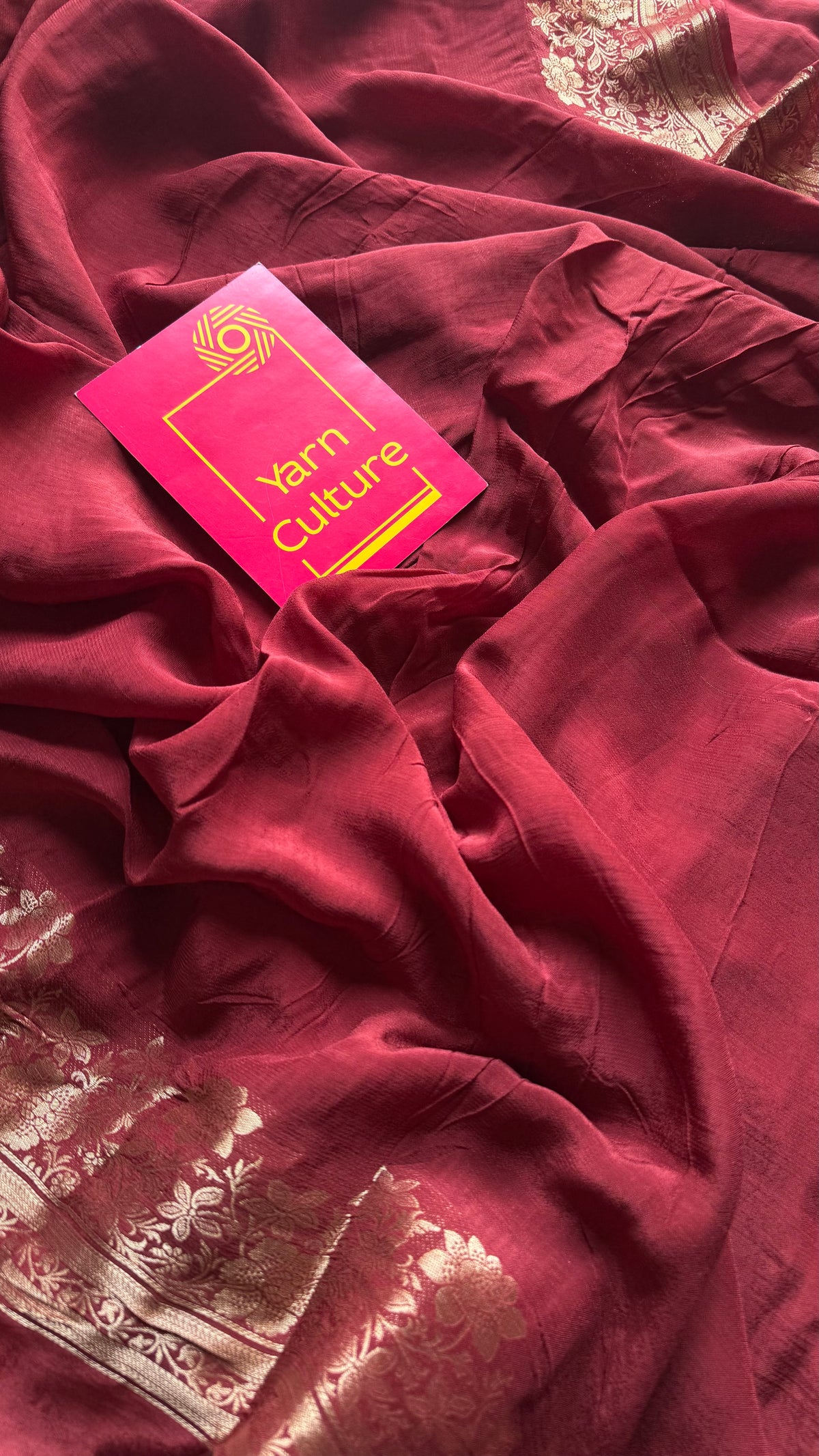 Maroon, semi crepe silk saree with antique gold floral border - YCLOKOC52