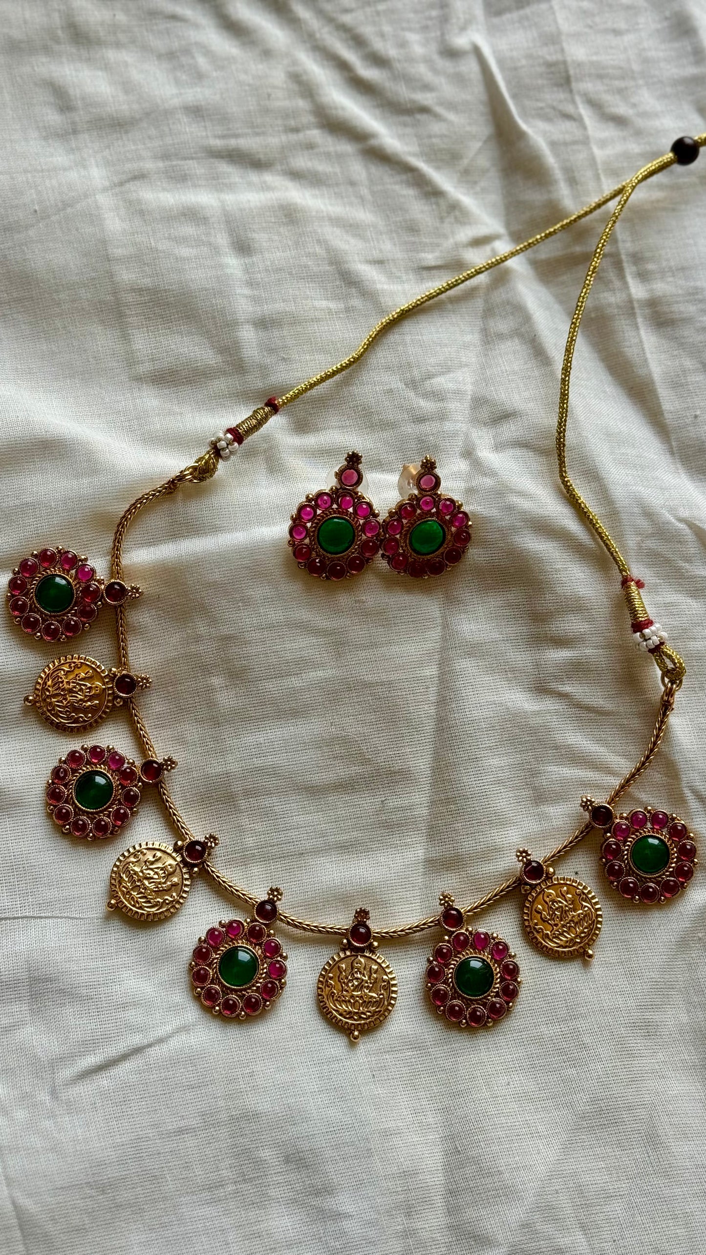 Antique gold multipendants, lakshmi coin, ruby and green stones with earrings - YCGPNP457