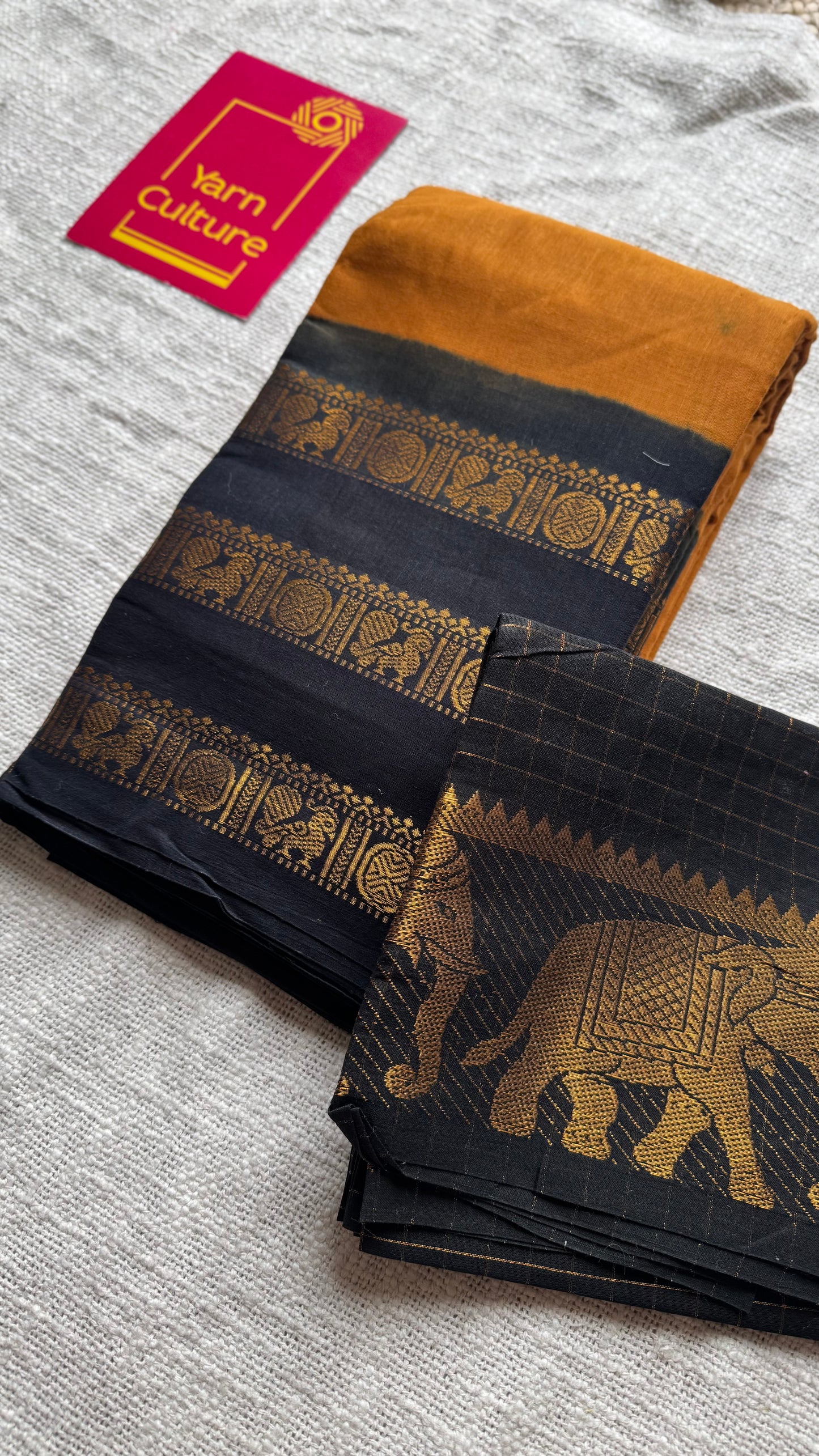 Turmeric yellow with black border, peacock and rudraksham motif, madurai soft cotton - YCCOTNJUSC01