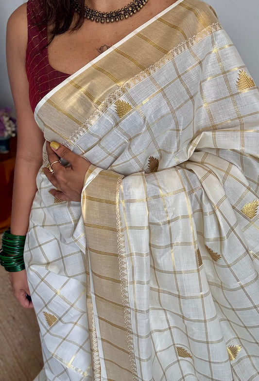 Ivory Kerala cotton saree with checks and gold jacquard motifs - YCIEKCFE319