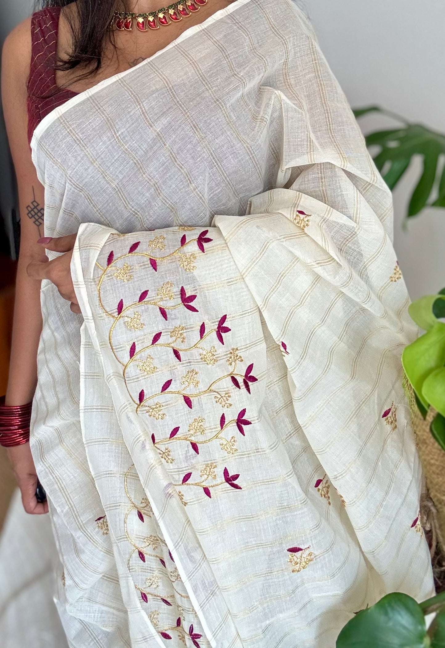 Ivory and gold soft cotton saree, purple pink floral vine embroidery - YCIEON56