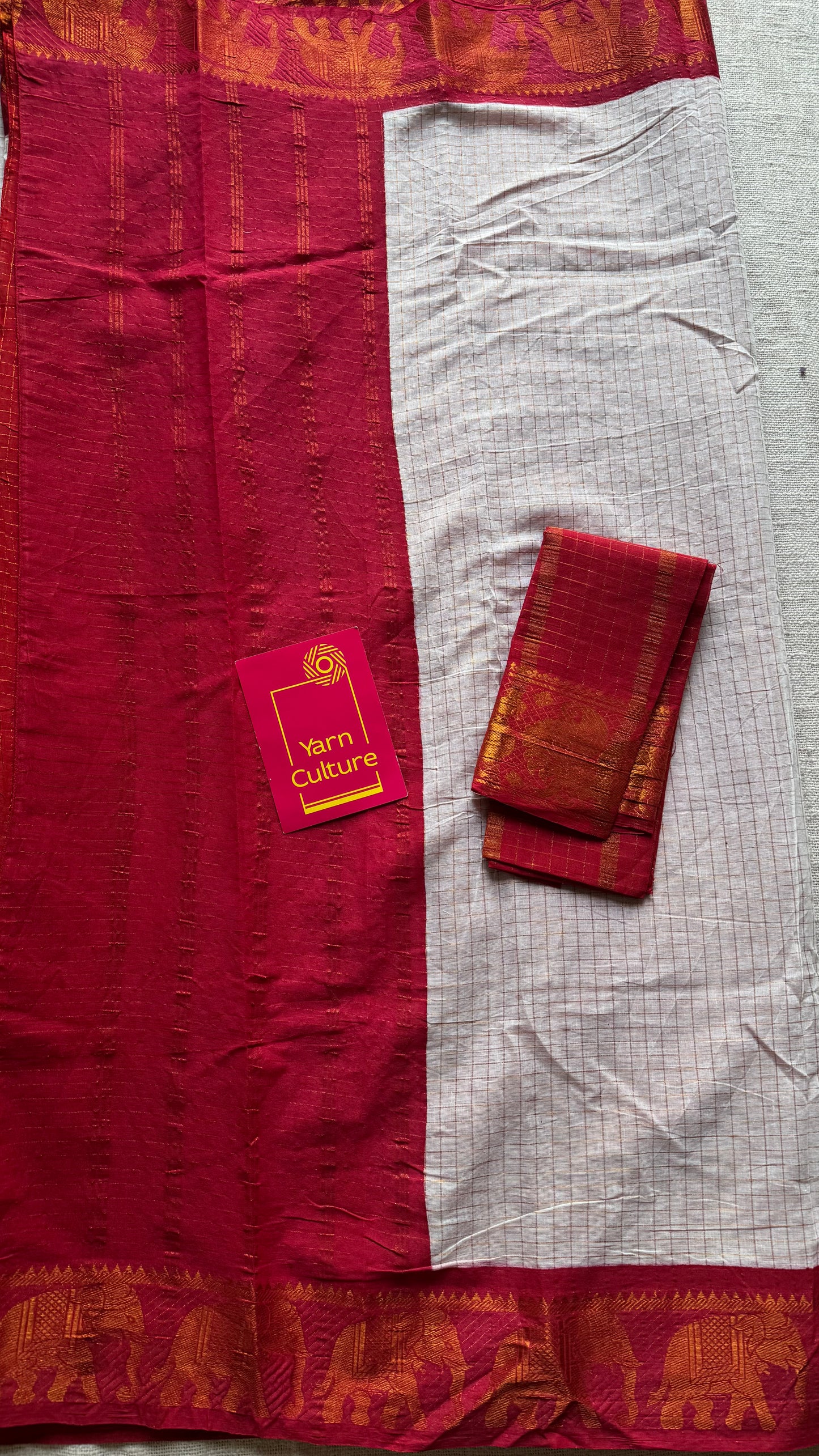 Ivory with red, sungudi cotton half-half saree - YCCOTNMSFE353