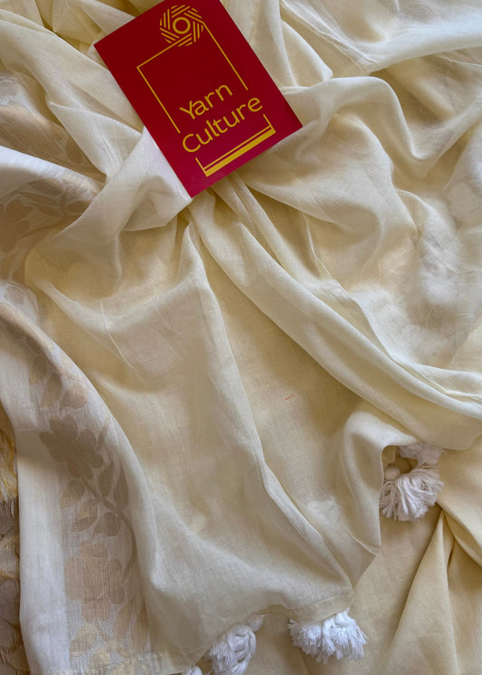 Ivory mul saree, zari flowers on border - YCIEON22