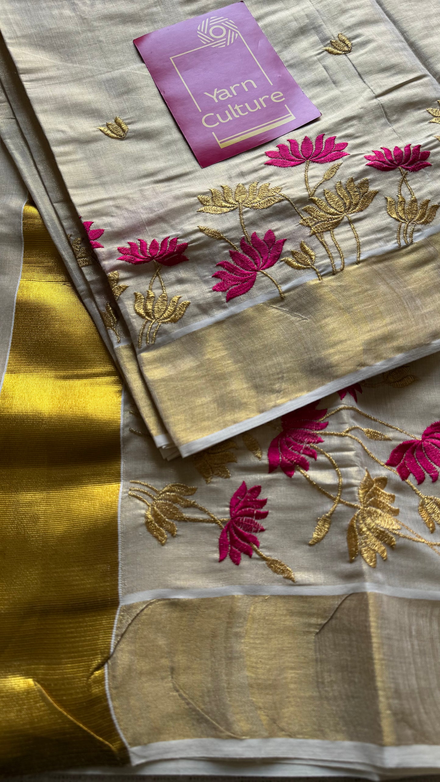 Ivory and gold tissue kerala cotton saree with hot pink and gold lotus embroidery - YCIEKCFE315
