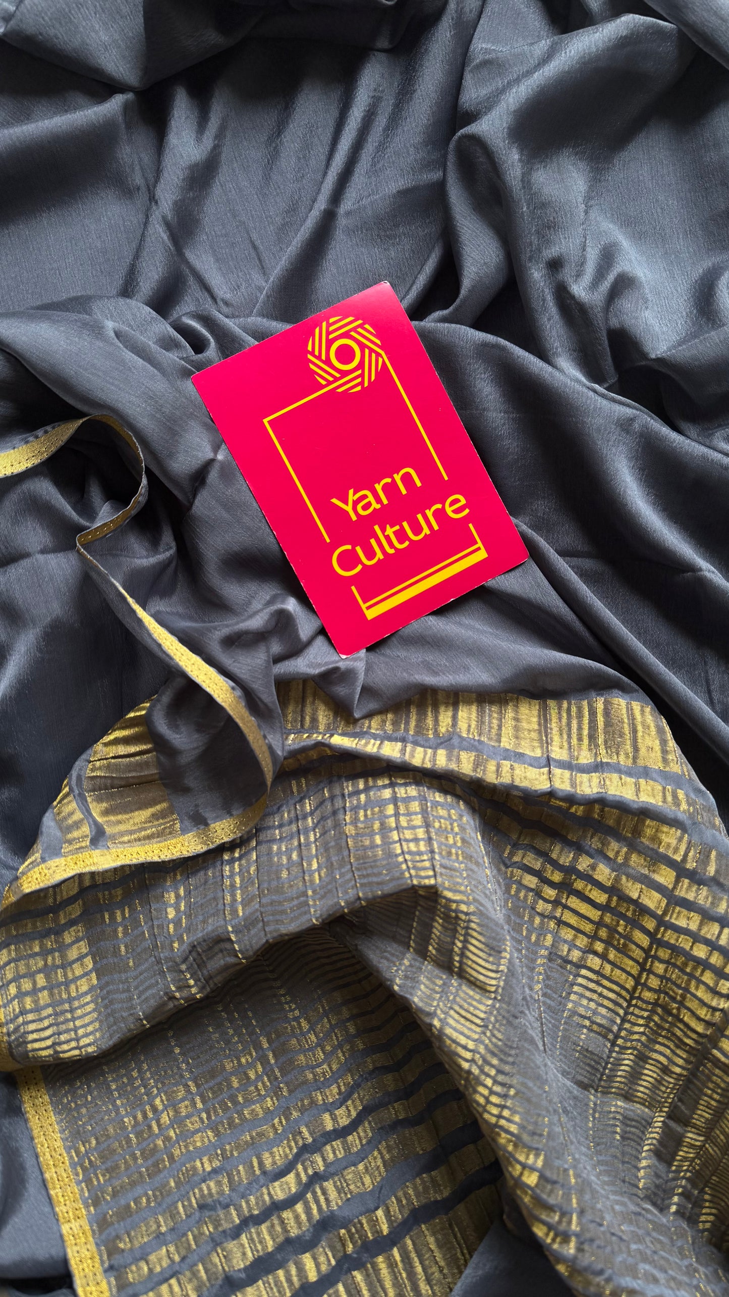Grey chiffon with thin gold zari border - YCDESE23