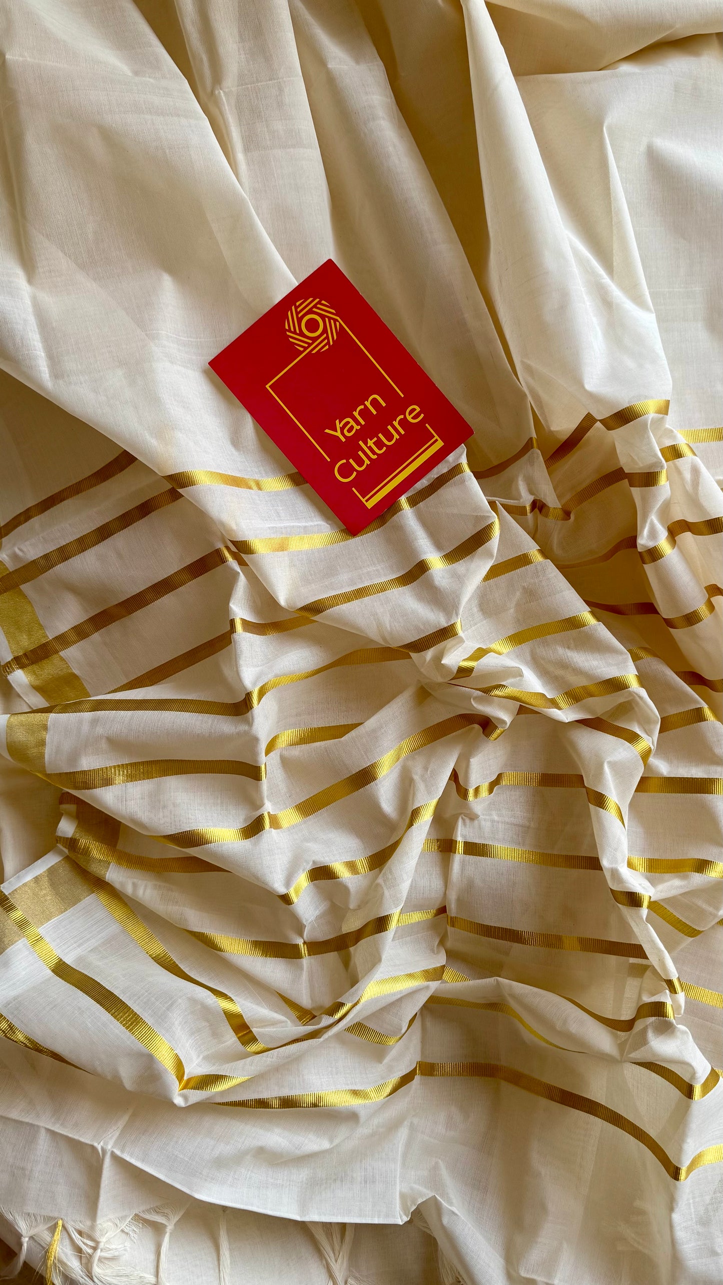 Handloom, woven in Chendamangalam Looms, ivory with gold striped pallu - YCIEON147