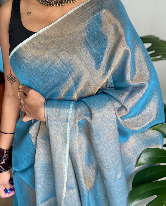 Teal blue with gold, dual tone metallic tissue linen saree - YCBCLTOC59