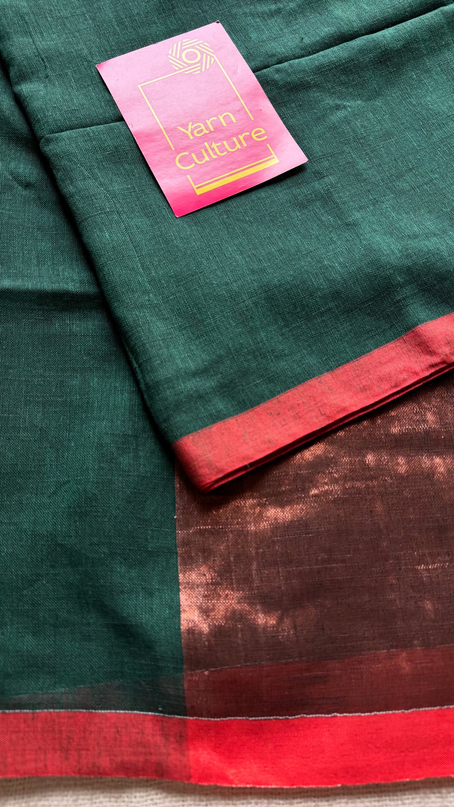 Dark green plain linen by cotton saree with copper zari pallu - YCBCLCFE397