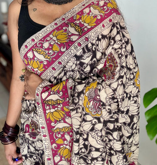Black with pink kalamkari saree, floral vines, soft cotton - YCWOTDMA347