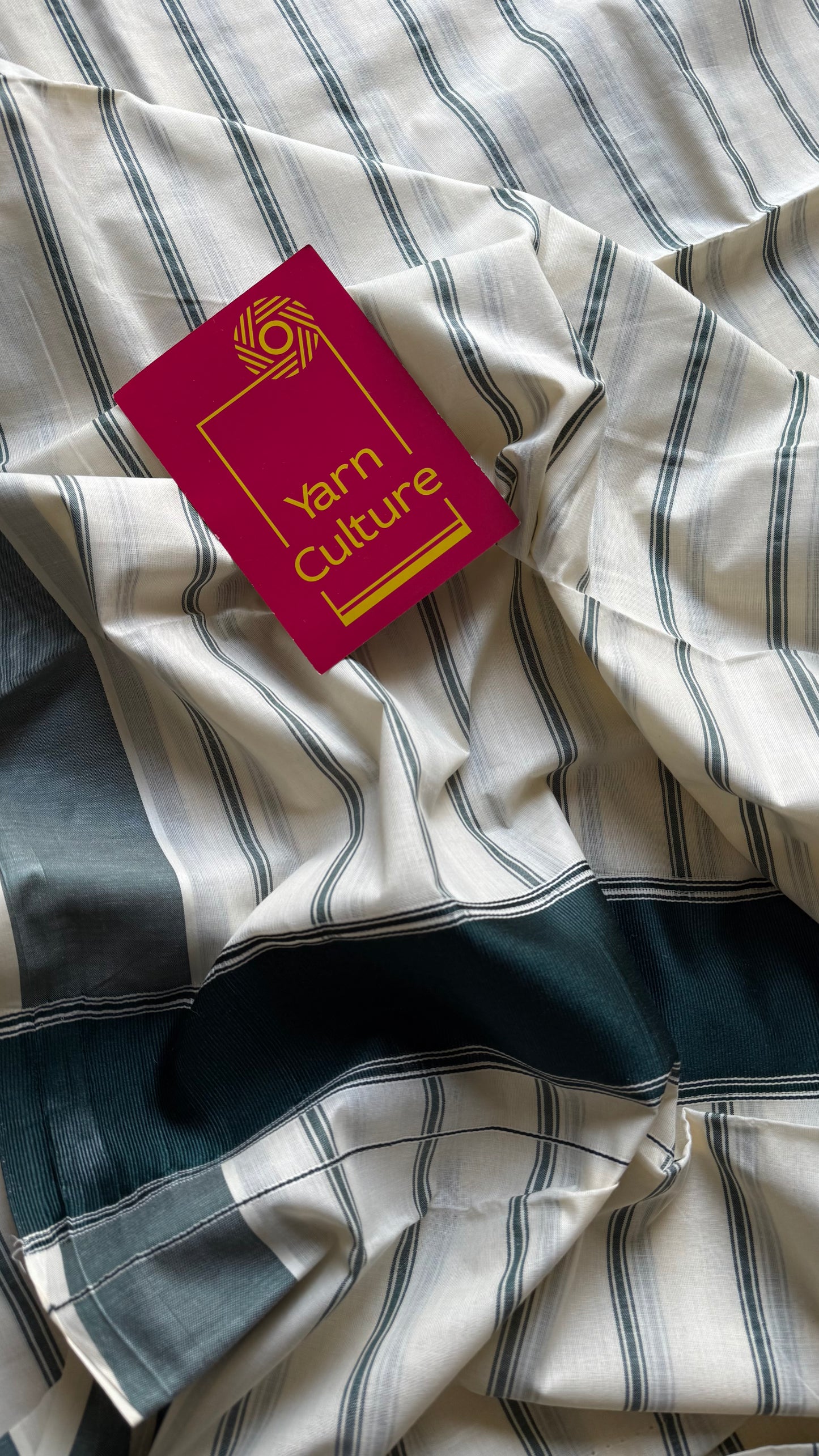 Ivory Kerala cotton saree with green stripes and border - YCIEKCFE323