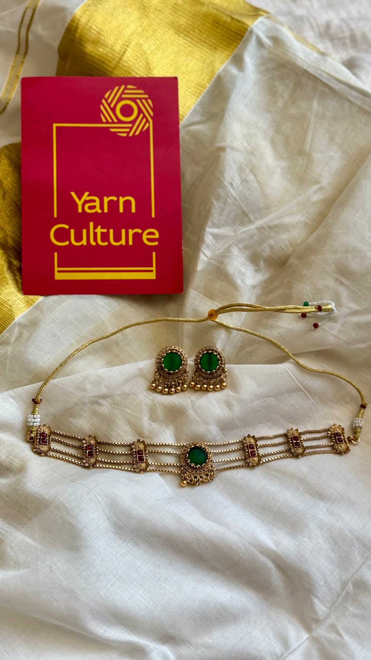 4 layered choker neckpiece with green pendant, with earrings - YCGPNP627