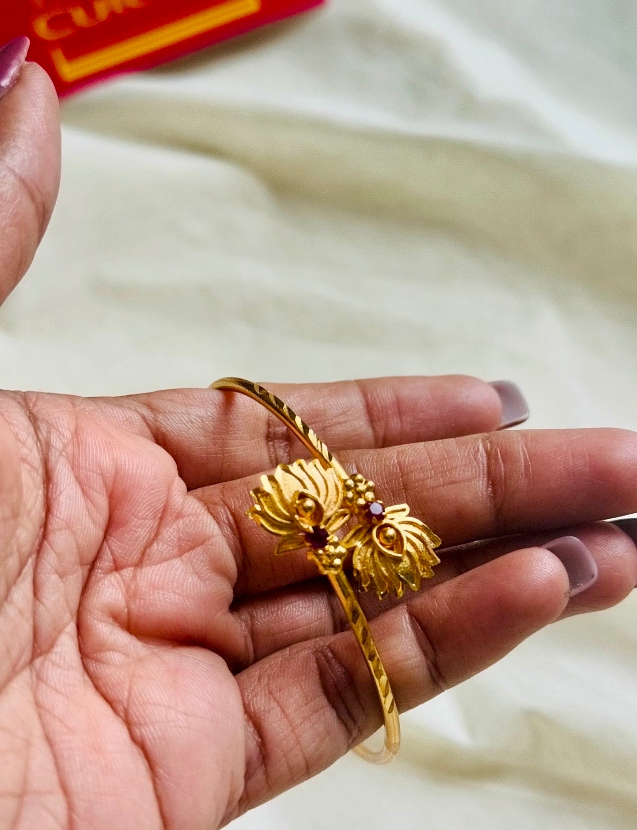 Adjustable gold toned lotus bangle - YCGPBA822