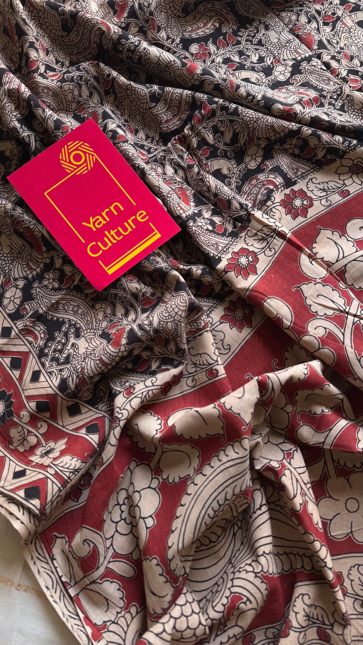 Black with red kalamkari saree, floral vines, soft cotton - YCWOTDMA352