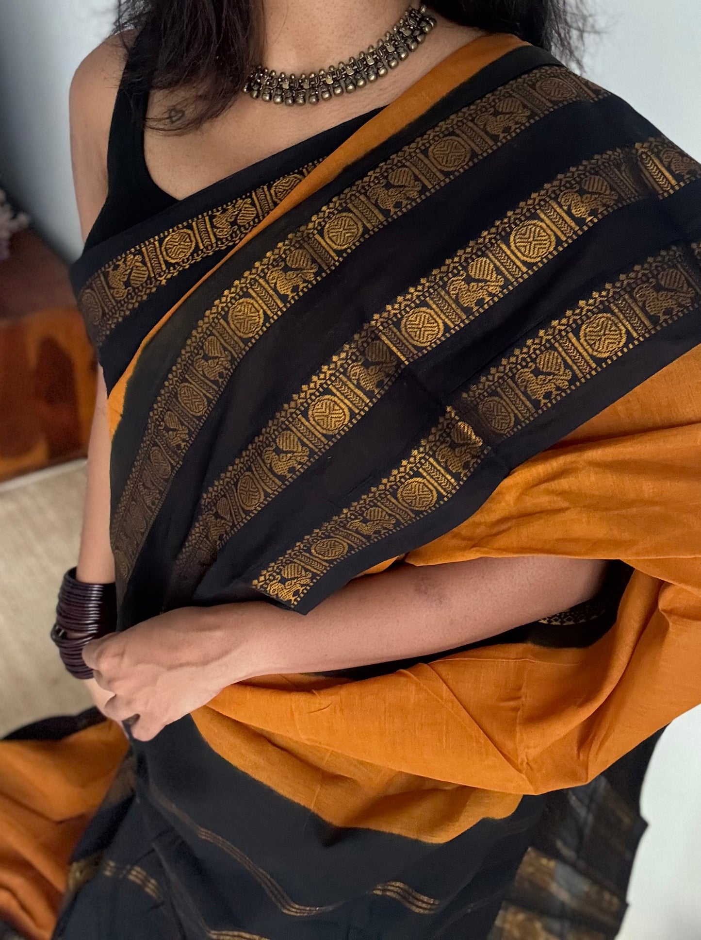 Turmeric yellow with black border, peacock and rudraksham motif, madurai soft cotton - YCCOTNJUSC01