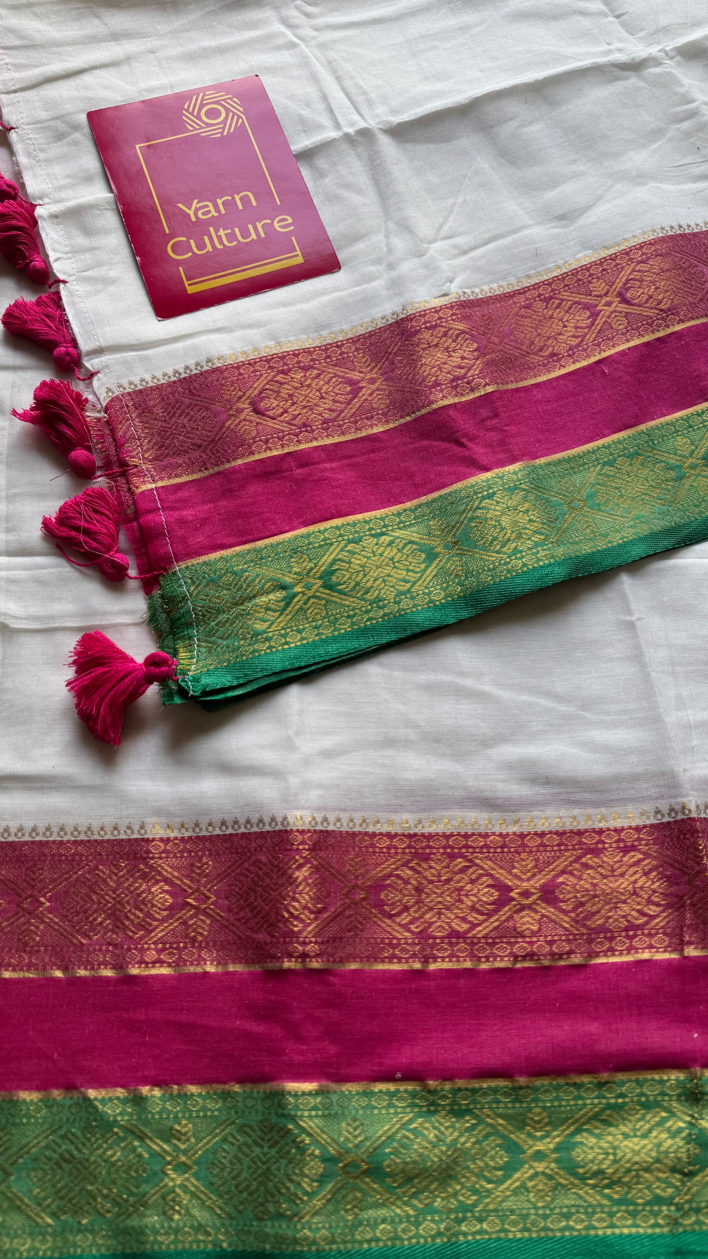 White mul with hot pink, green zari patterned border - YCBCMCLSE46