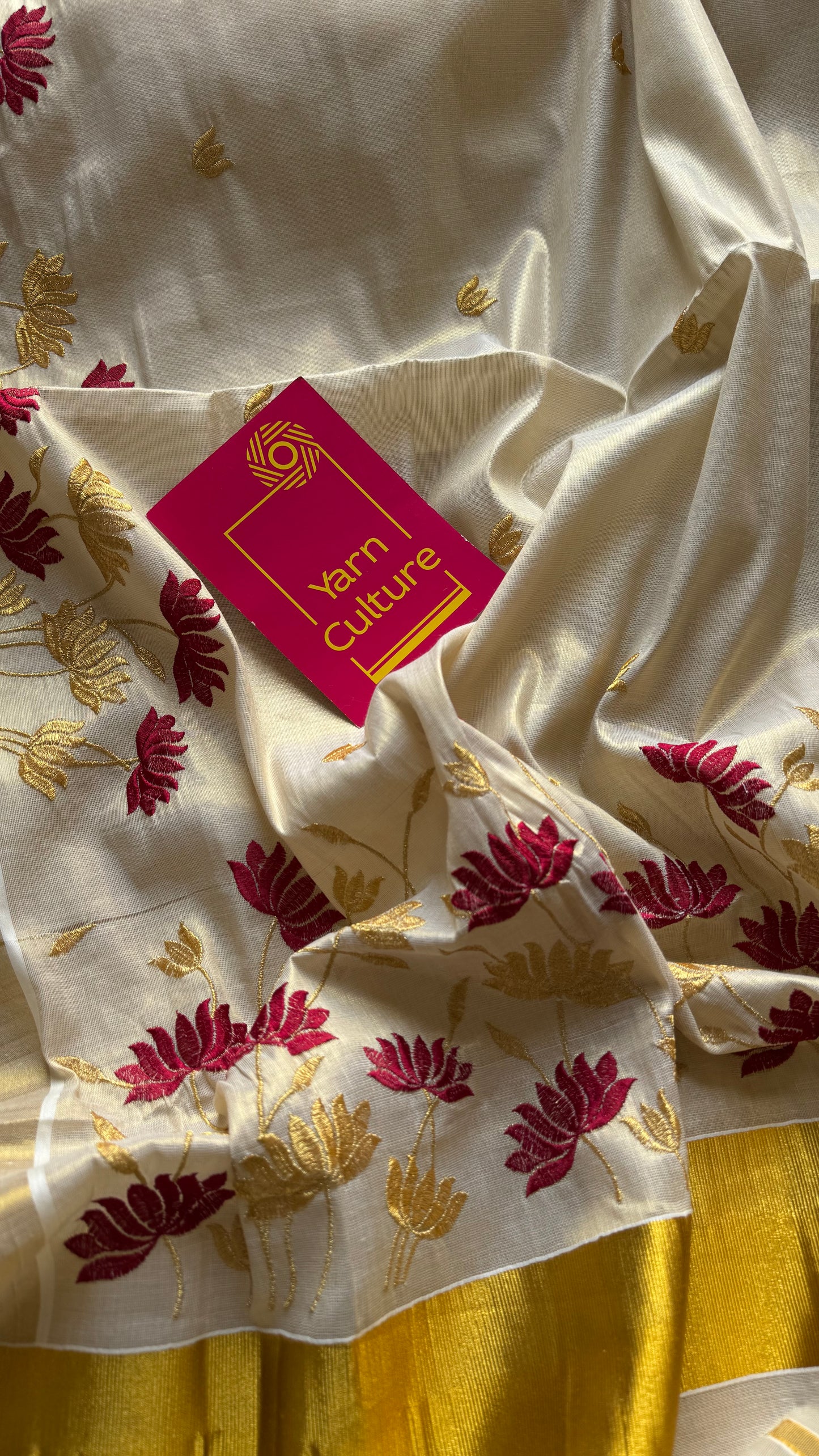 Ivory and gold tissue kerala cotton saree with maroon and gold lotus embroidery - YCIEKCFE316