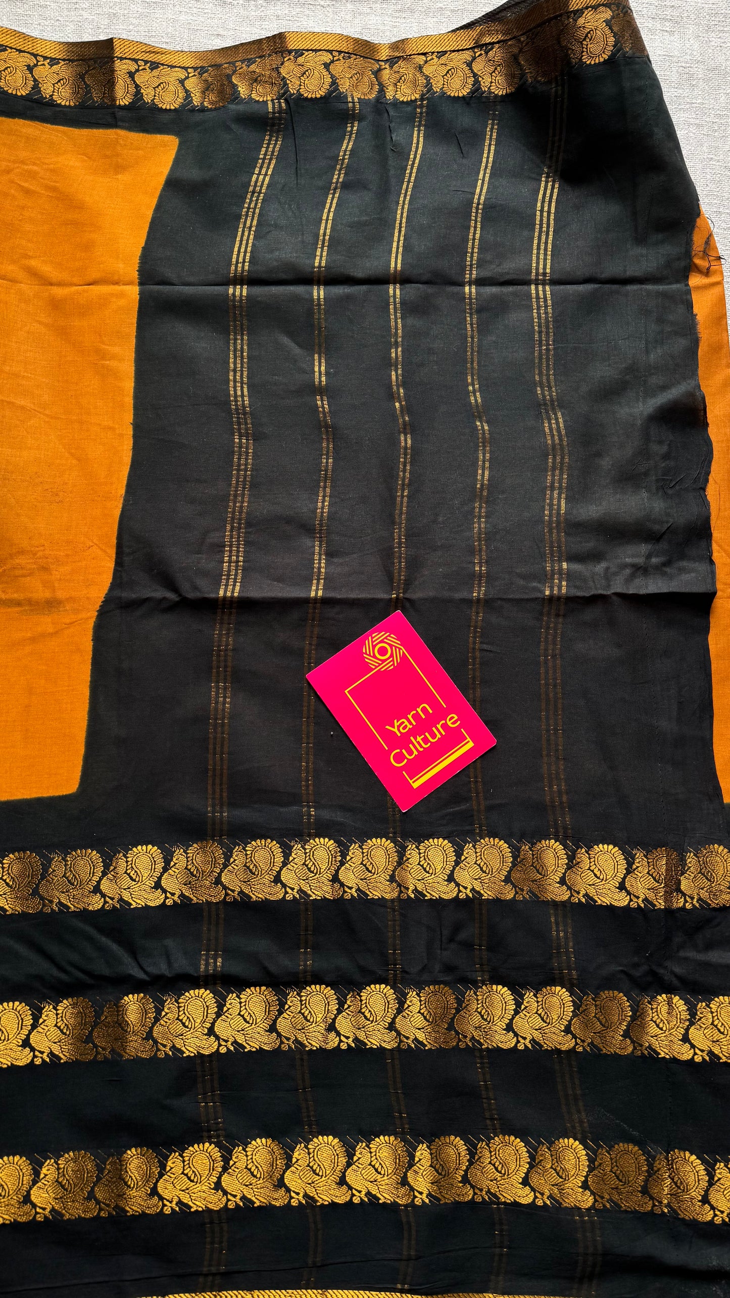 Dark turmeric and black sungudi with triple peacock motif rettai pettu wide border - YCCOTNSEMS46