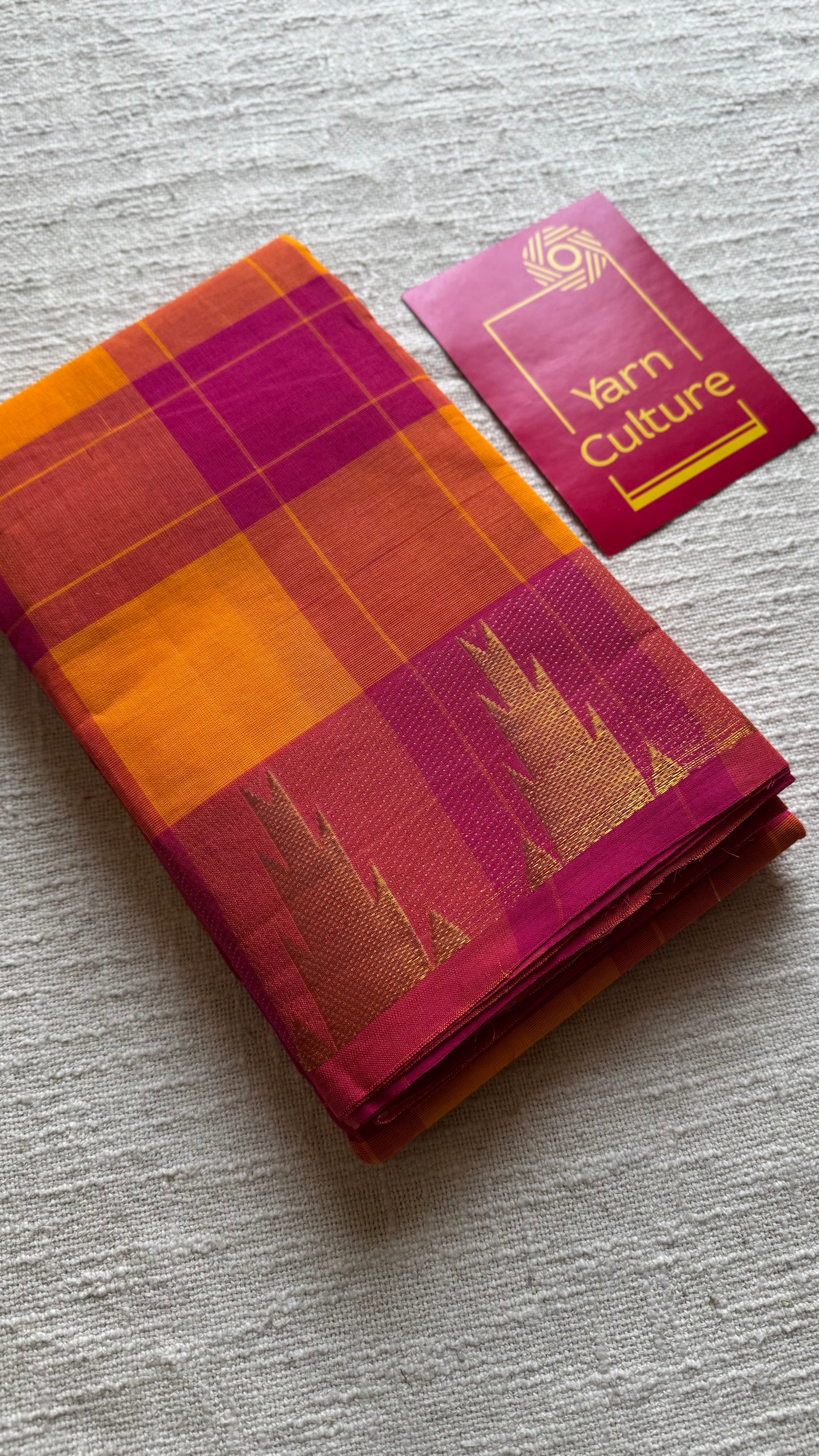 Chettinad cotton saree with yellow and pink checks, temple motif border - YCCOTNAP59