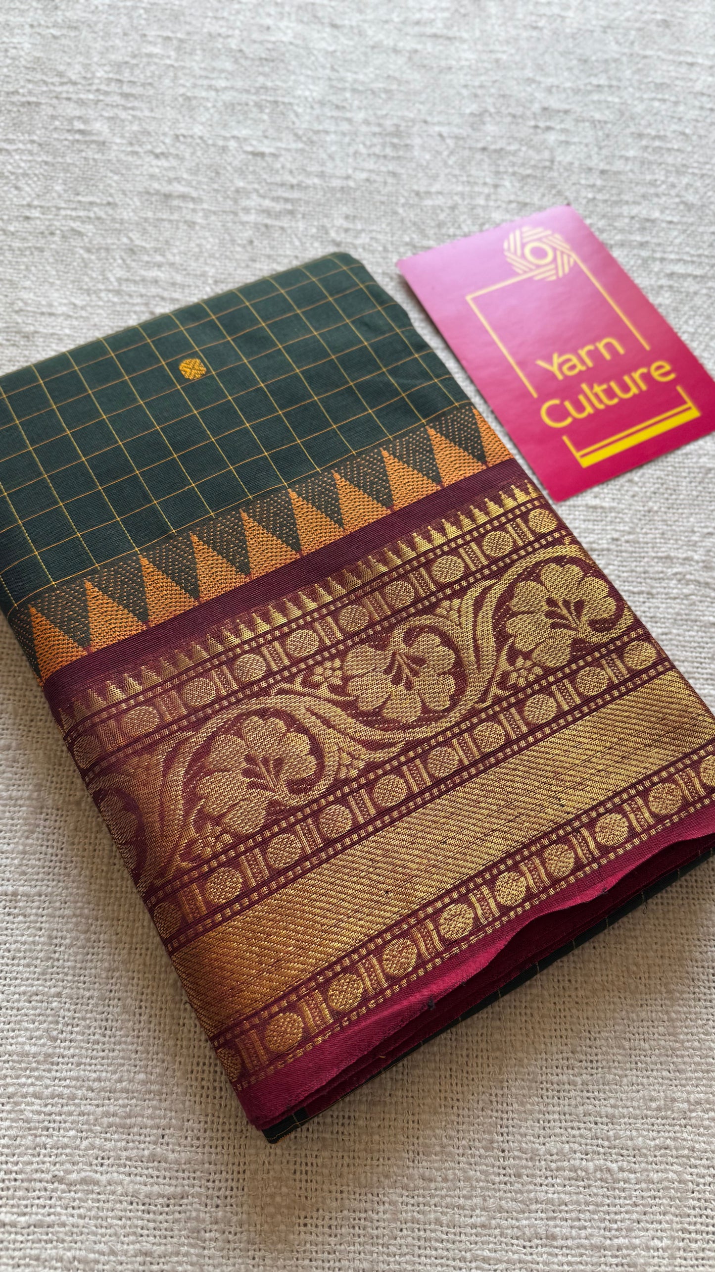 Dark green Kanchi cotton saree with checks, woven buttas and red zari border - YCCOTNCCFE161