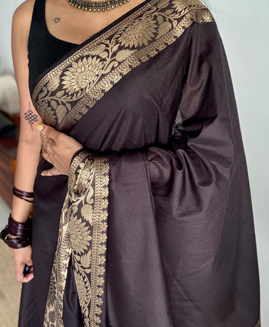 Black, semi crepe silk saree with antique gold floral border - YCLOKOC58