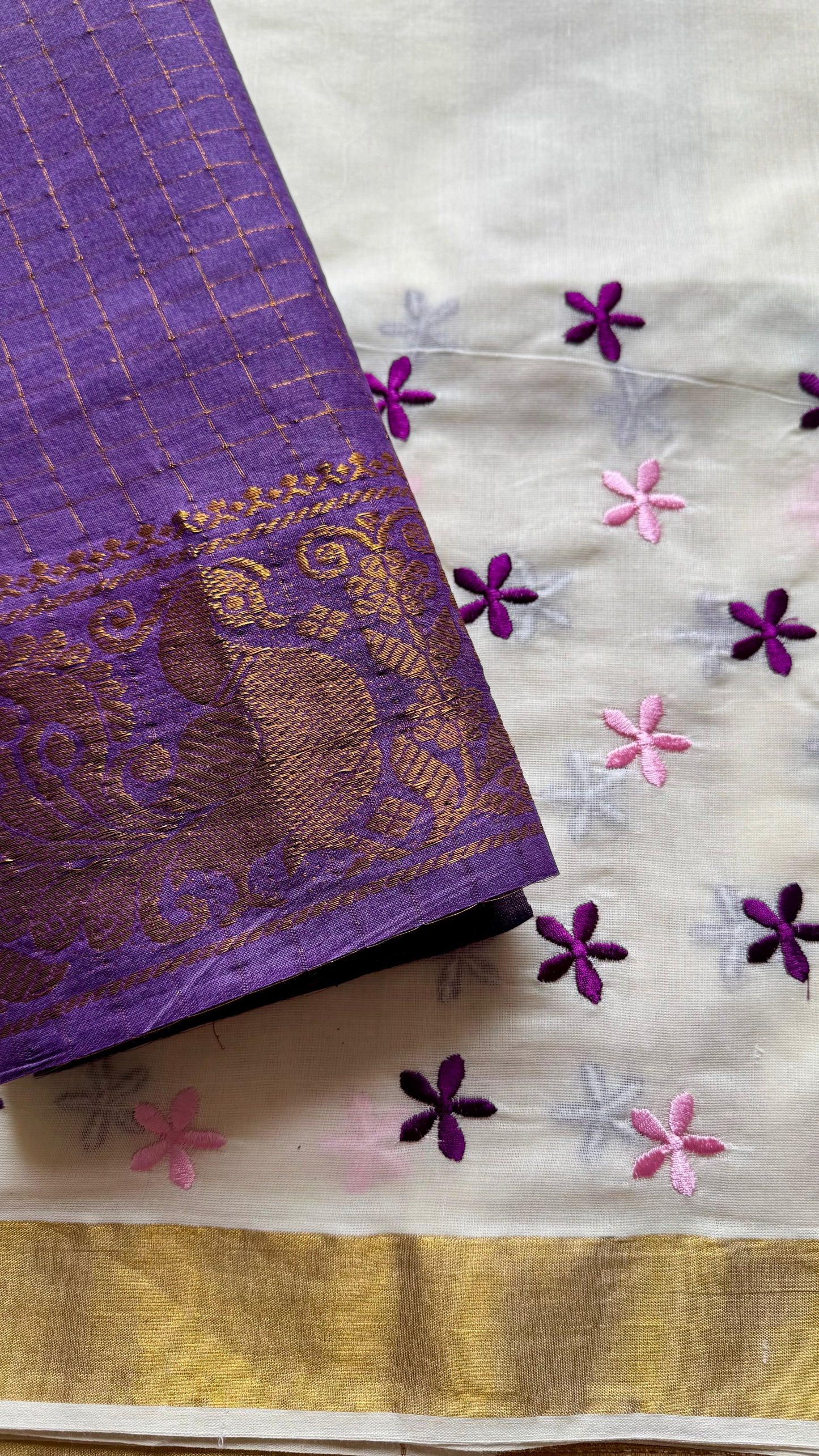 Anjana : Delicate purple and light pink flowers embroidered in soft Kerala cotton - YCONKCE156