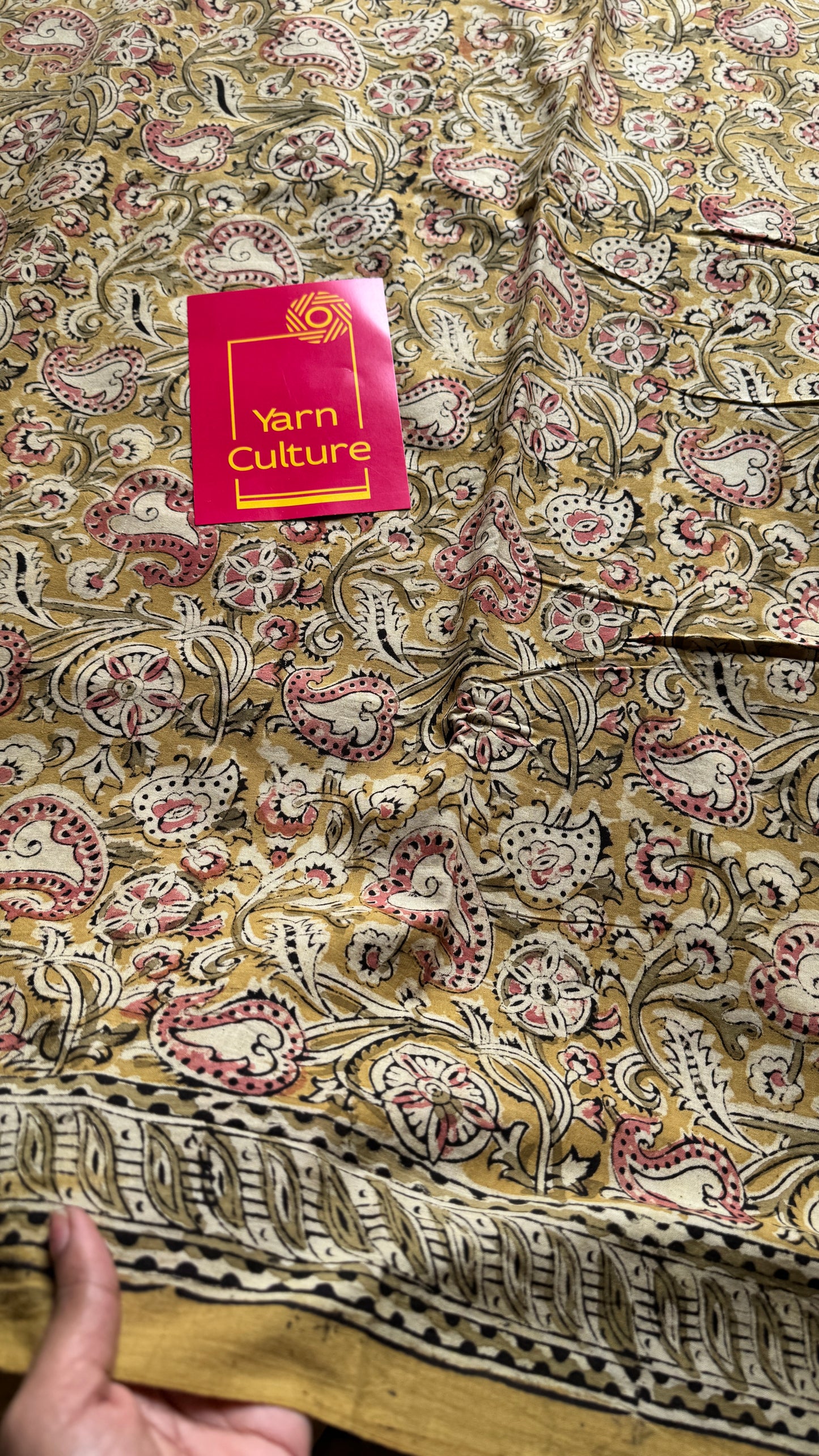 Ginger yellow kalamkari, pink floral vines, floral motif pallu