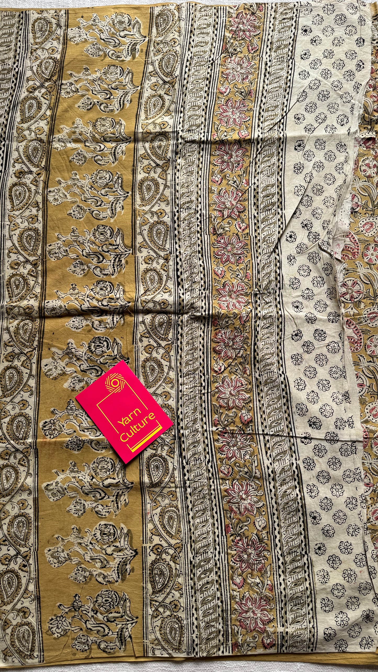Ginger yellow kalamkari, pink floral vines, floral motif pallu