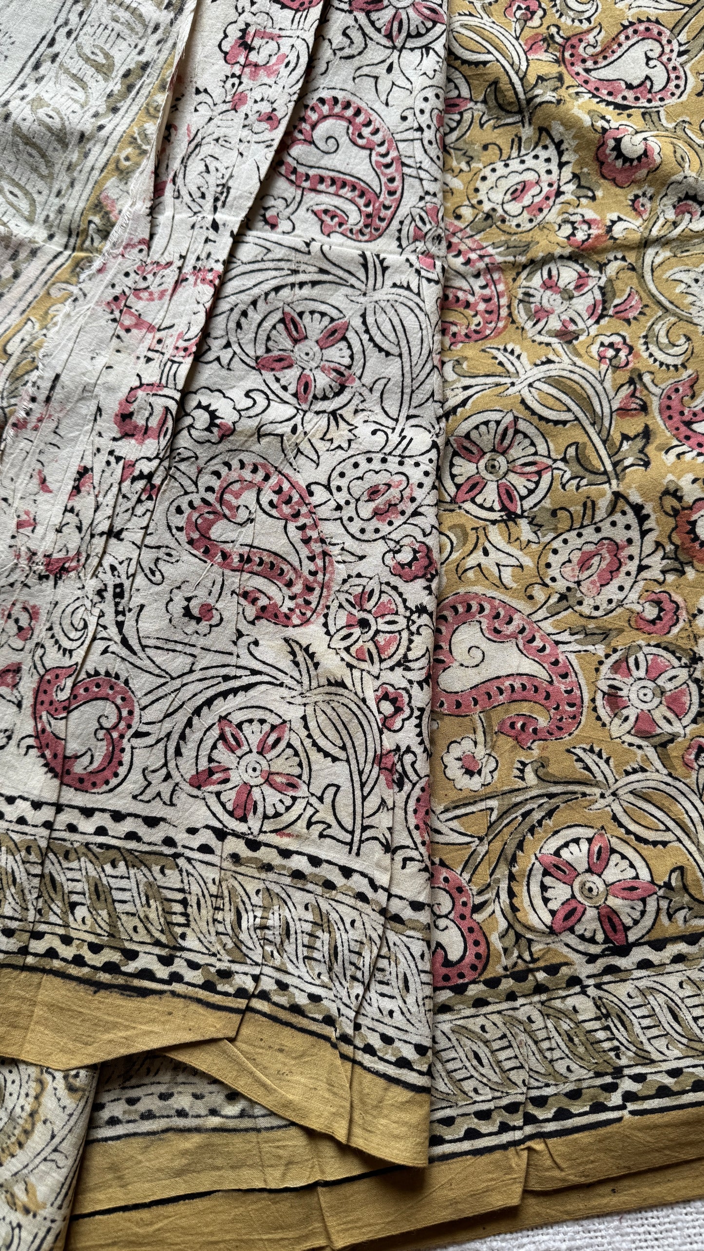 Ginger yellow kalamkari, pink floral vines, floral motif pallu