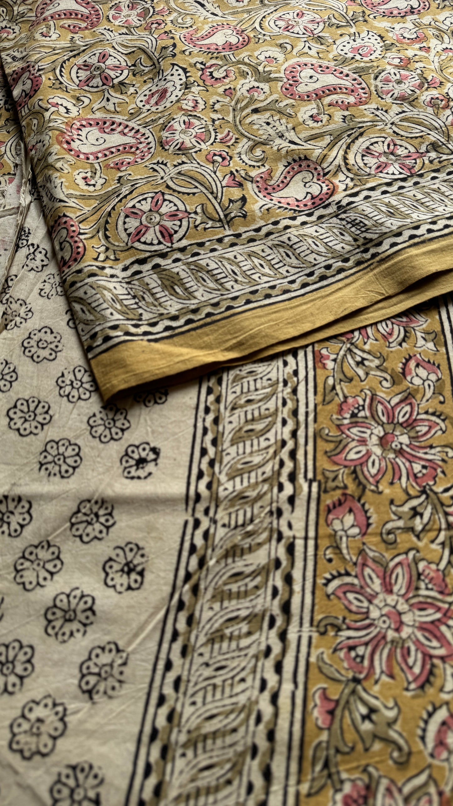 Ginger yellow kalamkari, pink floral vines, floral motif pallu