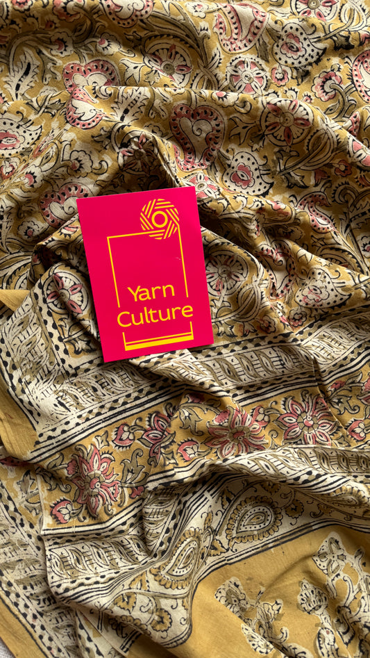Ginger yellow kalamkari, pink floral vines, floral motif pallu